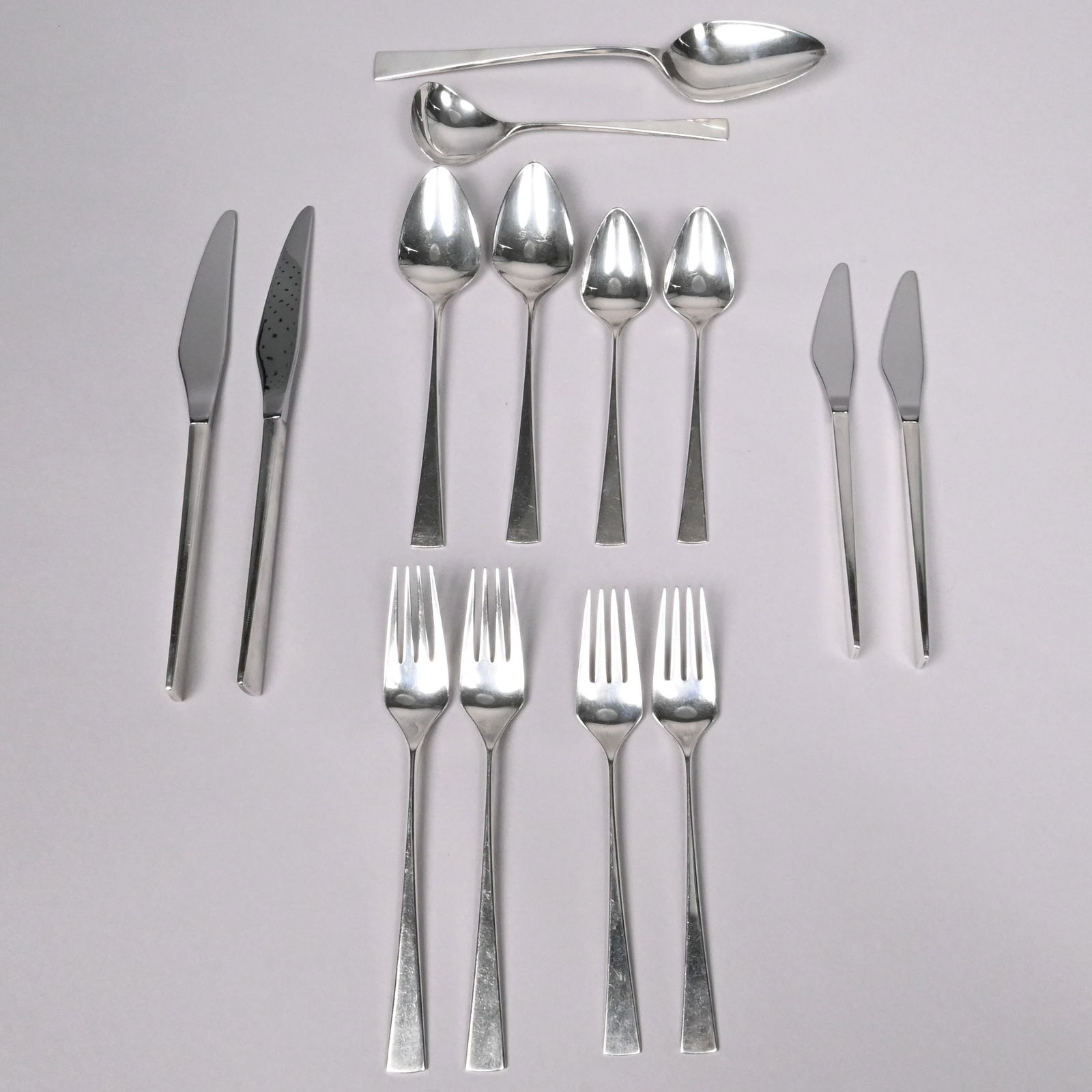 Mid-Century Modern Silver Place Setting for Two: Mid-Century Modern Sterling Silver 'Dimension' Place Setting for Two, Reed & Barton, Taunton, Massachusetts, 1961-2005. Comprising two 7-inch soup spoons, two 7-inch salad forks, two 7.5-inch regular