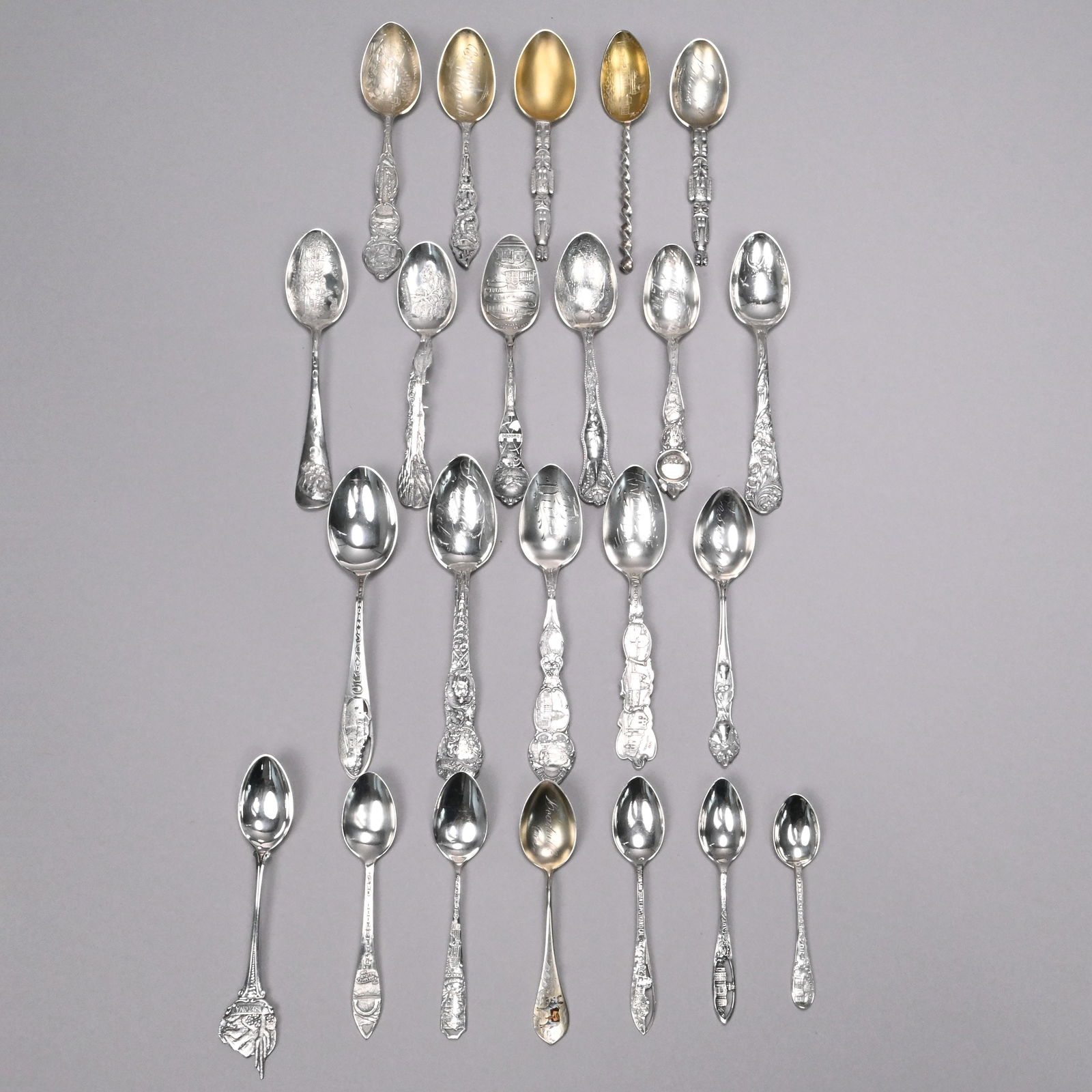 Large Group Western States Silver Souvenir Spoons: Large Group of Western States Silver and Silver-Gilt Souvenir Spoons, Various Makers, Late 19th-20th Century. Comprising eleven California spoons, two from Avalon Catalina Island, one from El Dorado