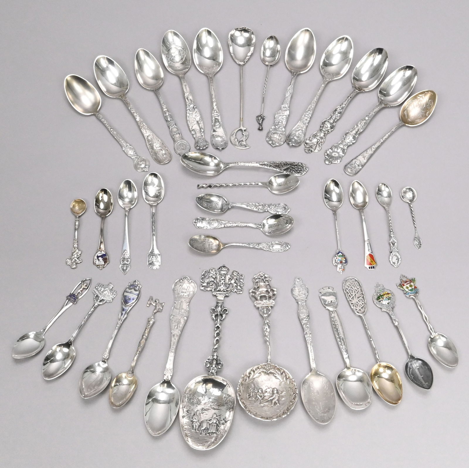 Grp US & International Silver Souvenir Spoons: Large Group of United States and International Silver and Silver-Gilt Miscellaneous Subject Souvenir Spoons, Various Makers, Late 19th-20th Century. Including two spoons pertaining to George