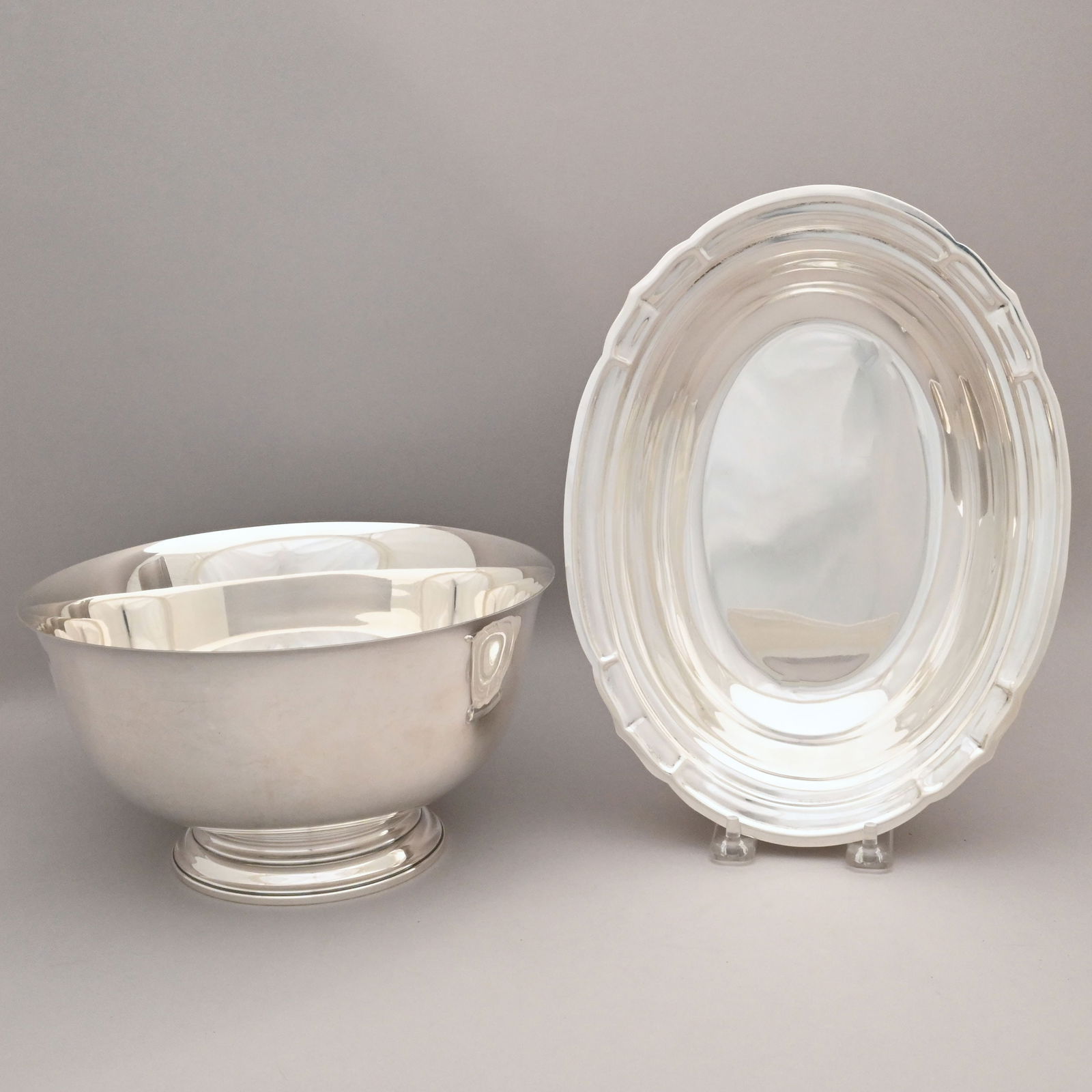 American Sterling Silver Dish and A Bowl: American Sterling Silver Dish and A Bowl, 20th Century. Comprising a 'Newport' pattern oval serving dish, Reed & Barton, Taunton, Massachusetts, factory mark, pattern "X596" and "Newport;" and a