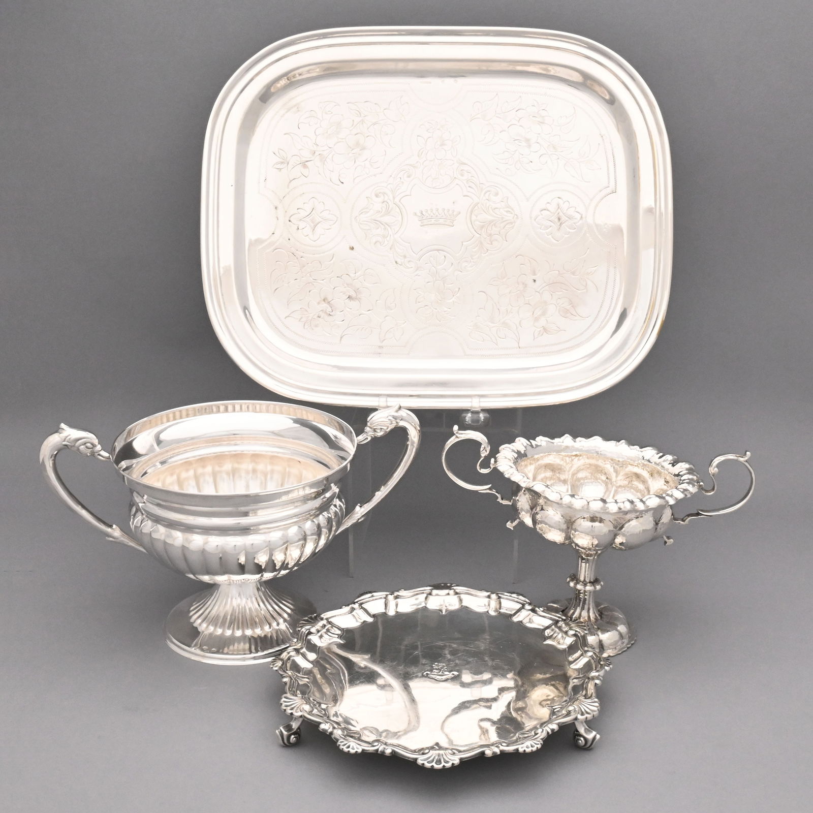 Two Edward VII & Two Continental Silver Articles: Two Edward VII and Two Continental Sterling Silver Serving Articles, Early 20th Century. Comprising an Edward VII crested waiter, Barker Brothers, Birmingham, 1902, engraved with the crest of a