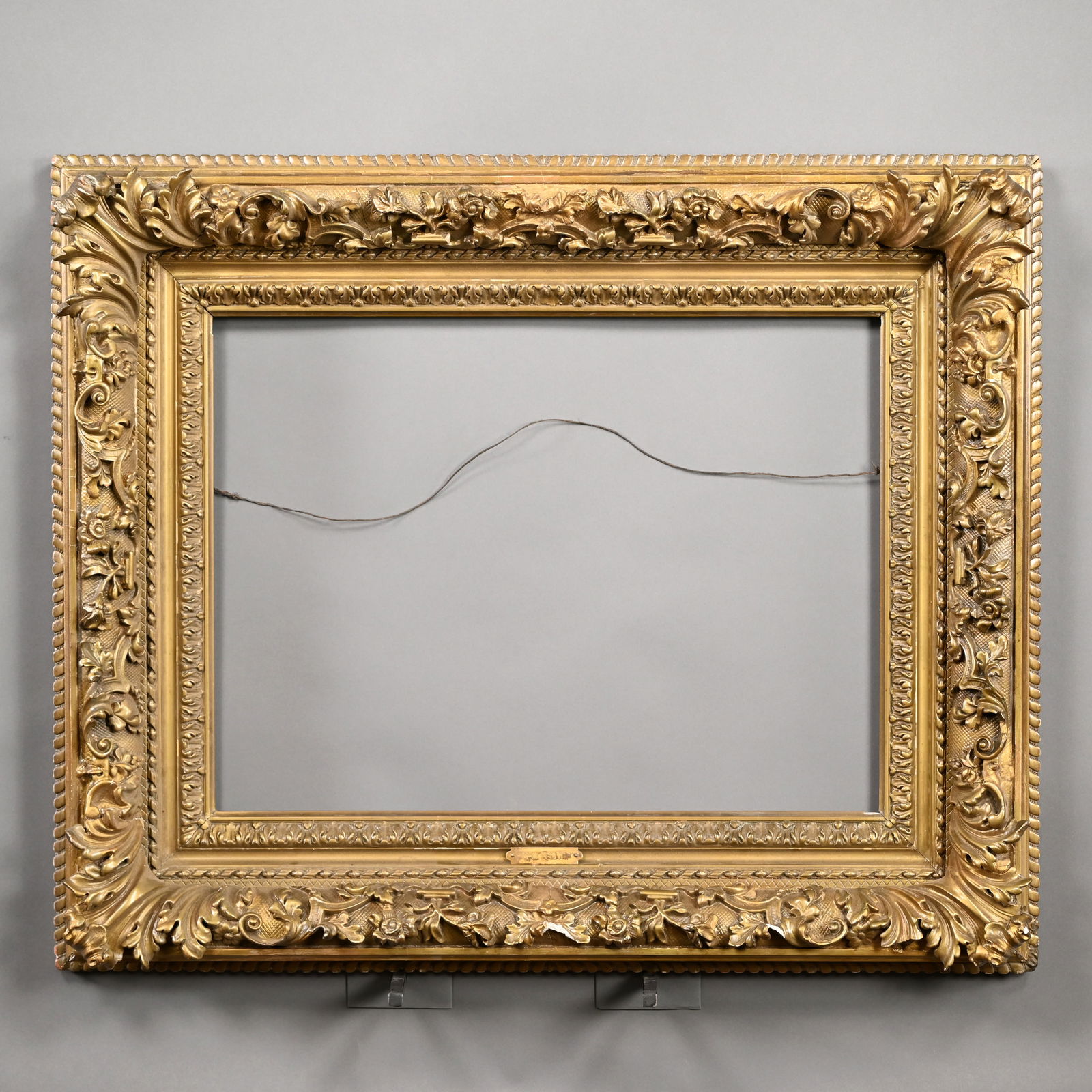 American Gesso Picture Frame, "Corot" Title Plate: American Giltwood and Gesso Picture Frame, Affixed with a Brass "COROT" Title Plate, Mid-19th Century.Rabbet: H: 19.625 in., W: 26.125 in.Frame: H: 31.25 in., W: 37.75 in., D: 5.25 in.