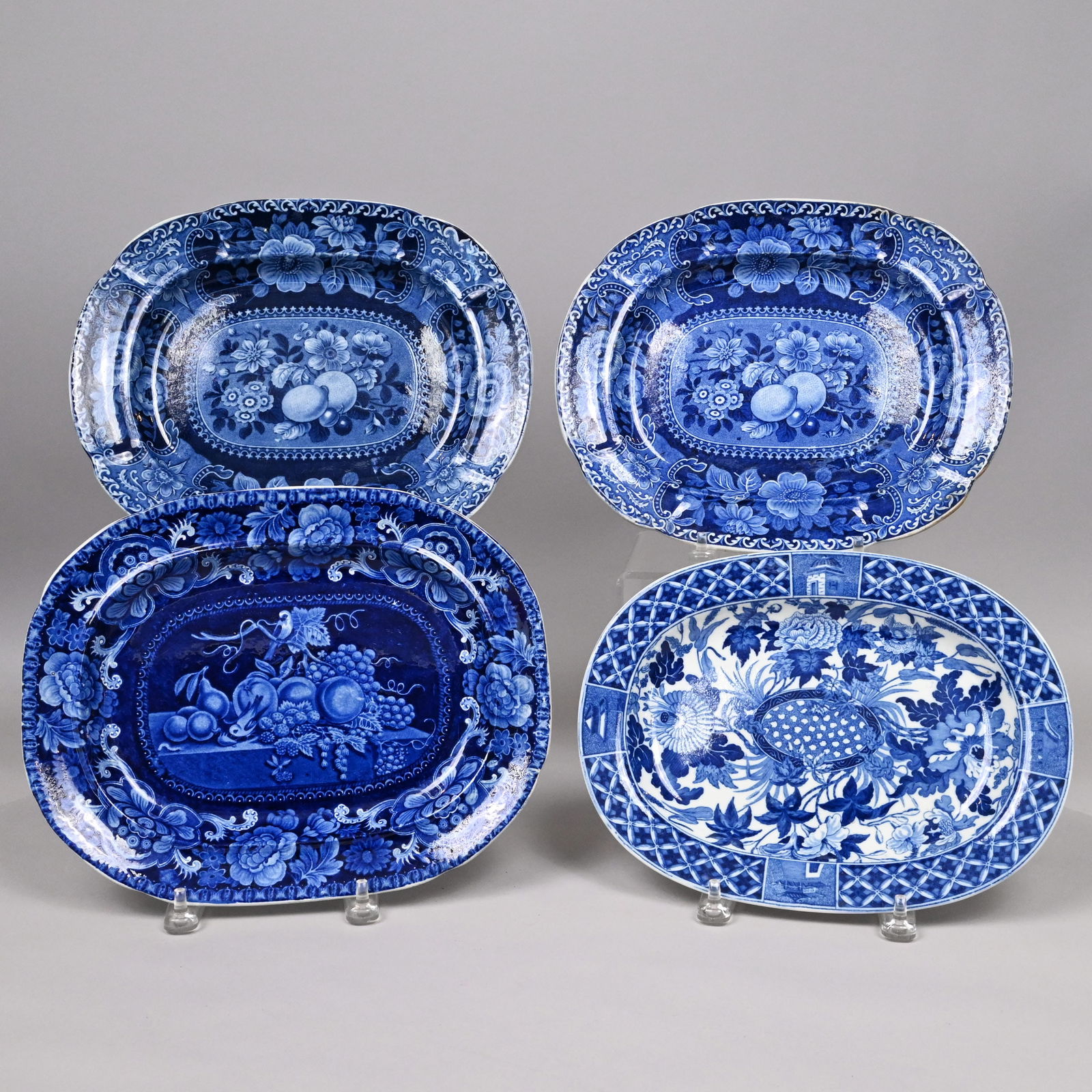 Four Staffordshire Blue Transfer-Printed Stands: Four Staffordshire Dark Blue Transfer-Printed Stands, 1825-1840. Comprising a pair of "Fruit and Flowers" 12.5-inch stands, unmarked; a "Birds and Fruits" 12.5-inch stand, unmarked, all three Stubbs