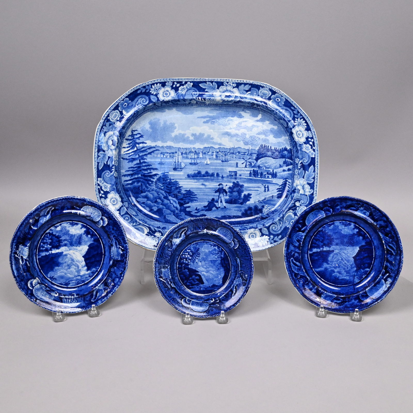 Three Staffordshire Plates and a Platter, New York: Three Staffordshire Plates and a Platter Depicting Views of New York, Various Makers, 1813-1846. Comprising 'Shell Border, Circular Center' Series, Enoch Wood & Sons, 1818-1846, one "View of Trenton F