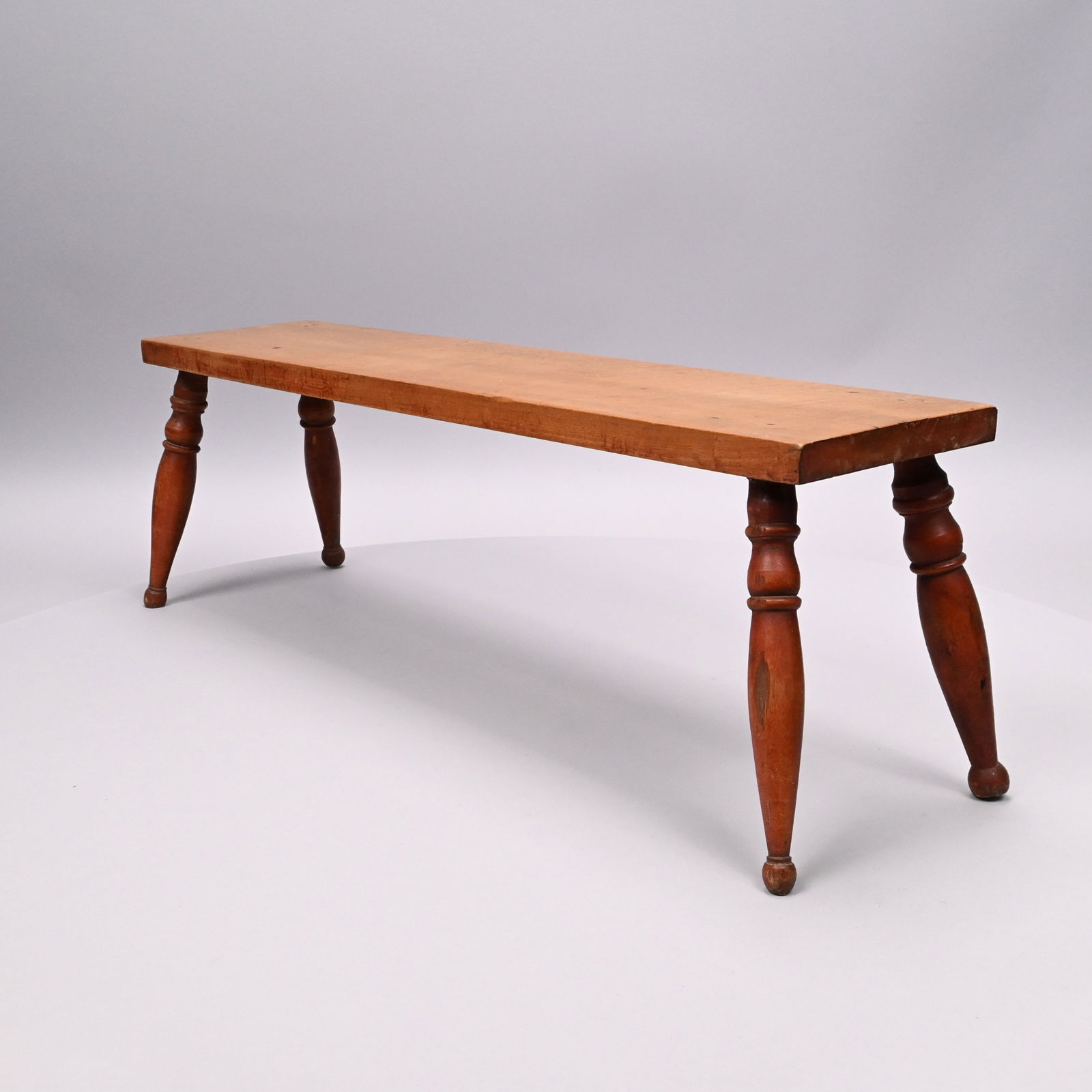 Griswold Sheraton Tiger Maple and Red Wash Stool: Miss Elizabeth Cogswell Griswold's Sheraton Tiger Maple and Red Wash Stool, Dated 1839. The rectangular tiger maple top raised on ring-turned slightly swelled legs in red wash, inscribed beneath