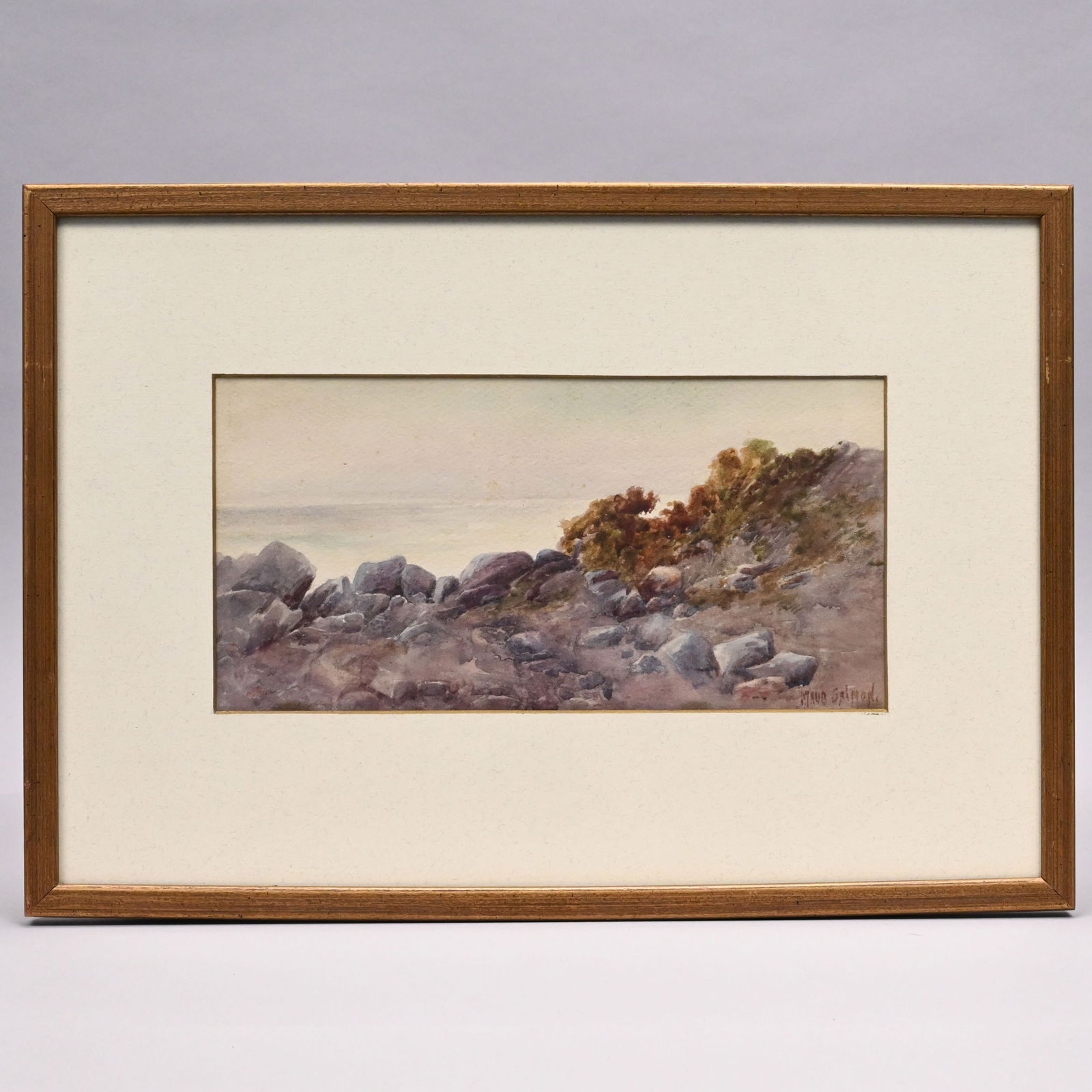 Maud Salmon - Rocky Coastal Scene, Wales: Maud Salmon (Welsh, 1872 - 1964). Rocky Coastal Scene, Wales. Watercolor on paper, signed "Maud Salmon" lower right, (5 x 10 inches, sight).Frame: H: 11 in., W: 15.5 in., D: 0.5 in.
