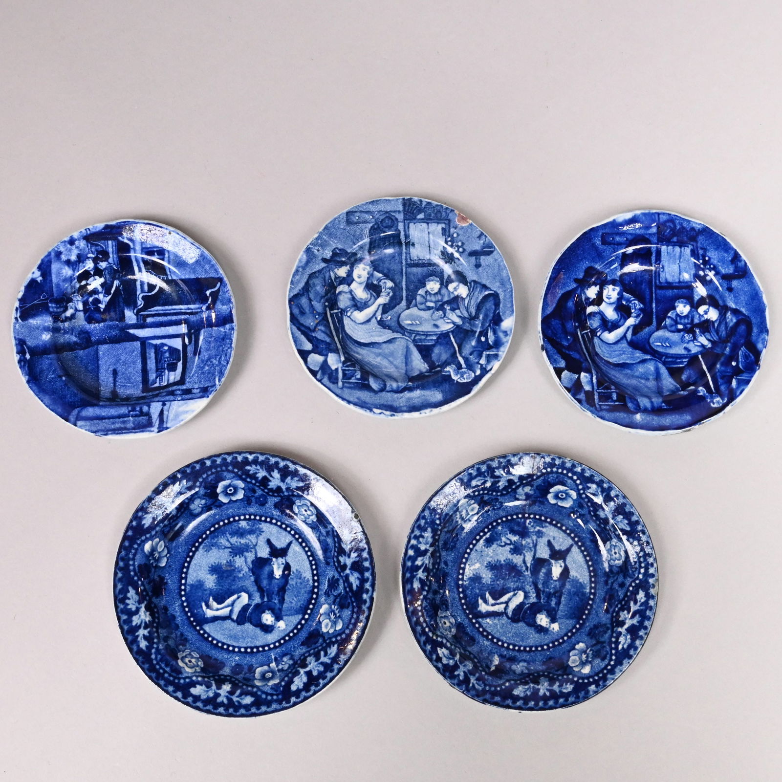 Don Quixote &Wilkie, Five Staffordshire Cup Plates: 'Don Quixote' Series and 'Wilkie's Designs' Series, Five Staffordshire Dark Blue Transfer-Printed Cup Plates, James & Ralph Clews, 1830-1850. Comprising the 'Don Quixote' series, two 3.875-inch