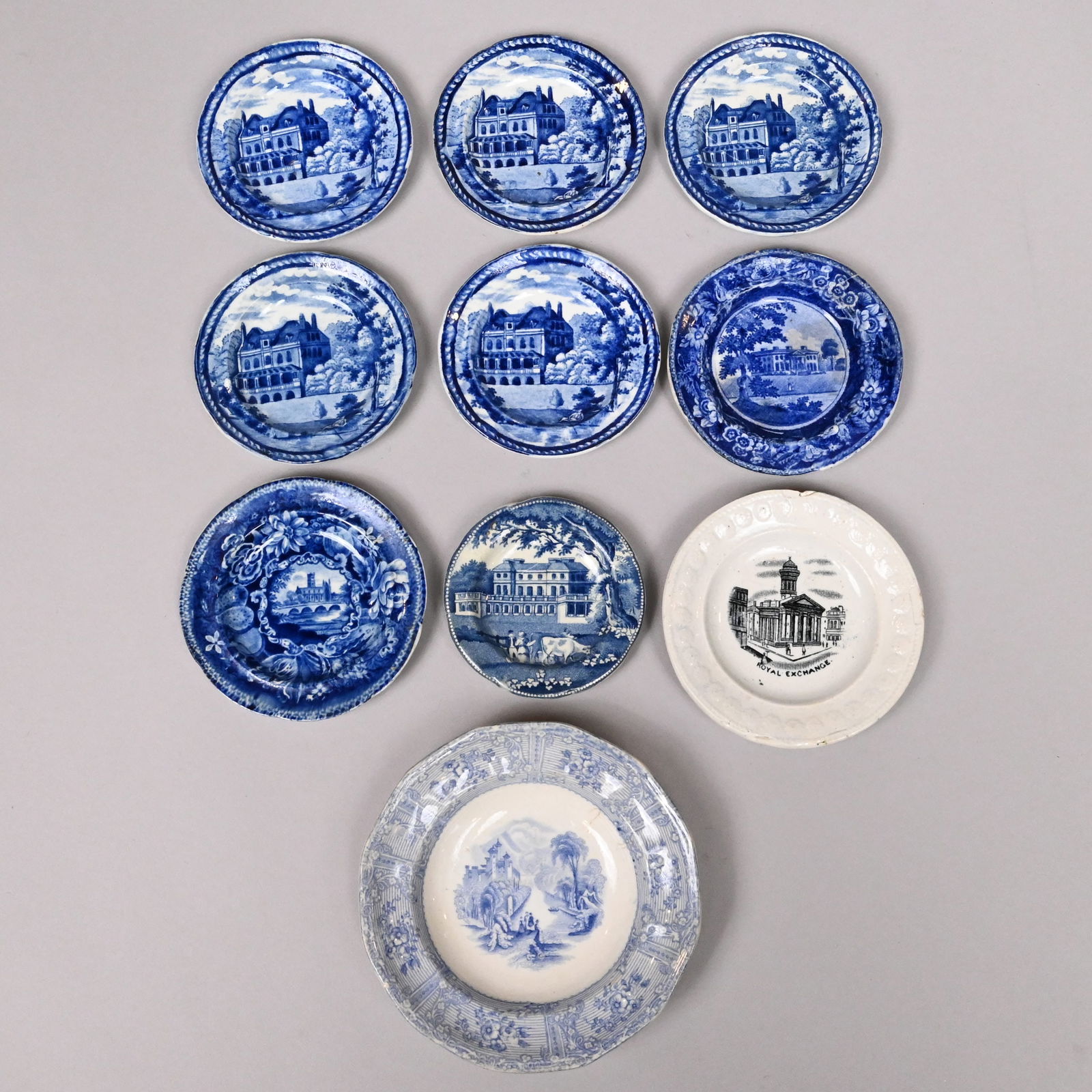 Eig Staffordshire Printed English Views Cup Plates: Eight Staffordshire Dark Blue Transfer-Printed Cup Plates Depicting English Views, 1818-1849, and a Fruit Dish and a Children's Toy Dinner Plate. Comprising 'Grapevine' series, set of five "Shirley