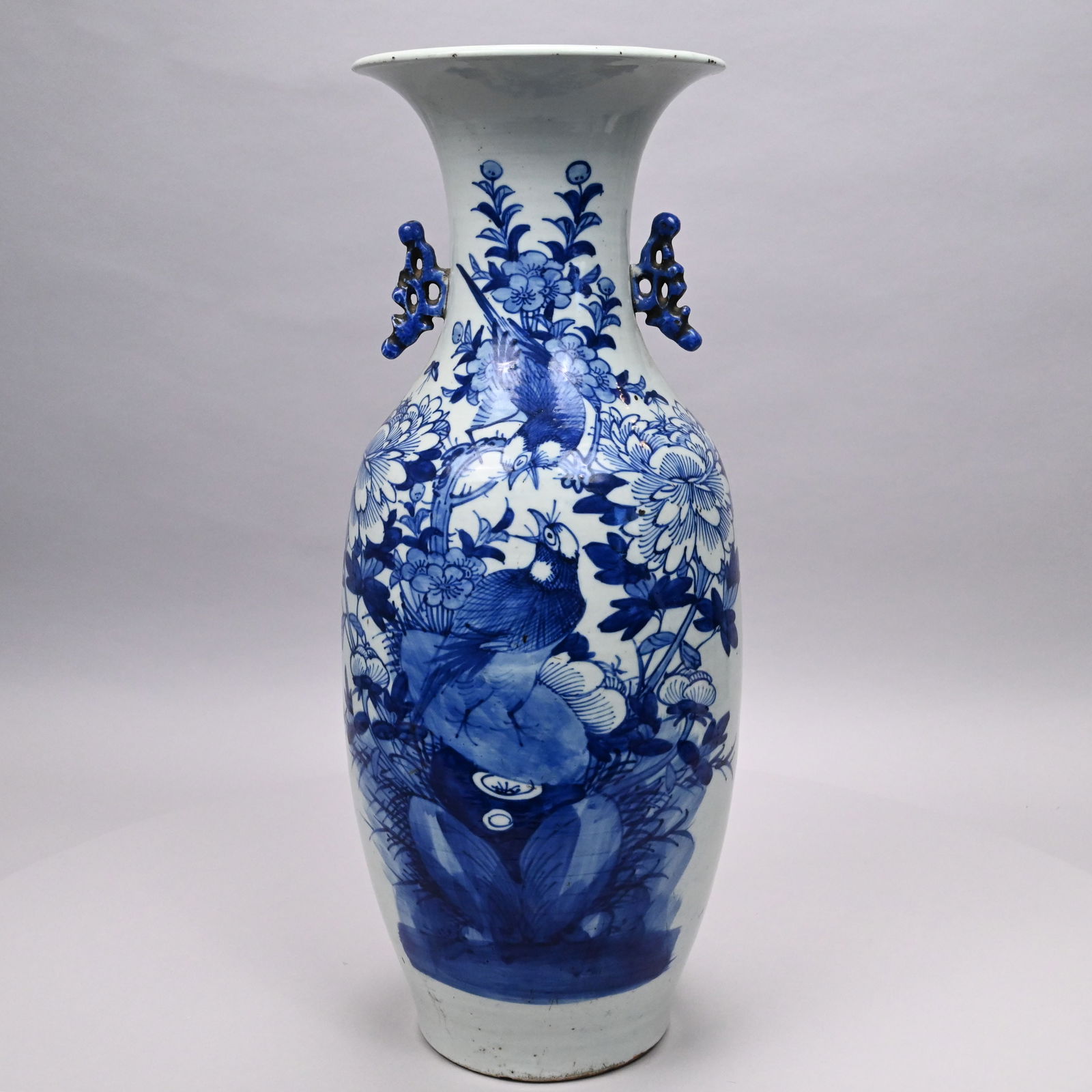 Chinese Blue and White Porcelain Baluster Vase: Chinese Blue and White Porcelain Baluster Vase, Early 20th Century. Painted on the front in underglaze-blue with a pair of birds chirping at one another in a peony bush, fitted with pierced handles.H: