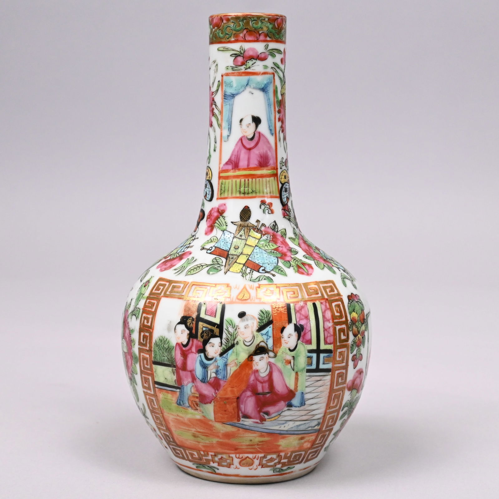 Chinese Export Porcelain Famille Rose Bottle Vase: Chinese Export Porcelain Famille Rose Bottle Vase, Second Half 19th Century. Painted on two sides with a group of court figures seated before a pavilion, each within a gilt key-fret border,