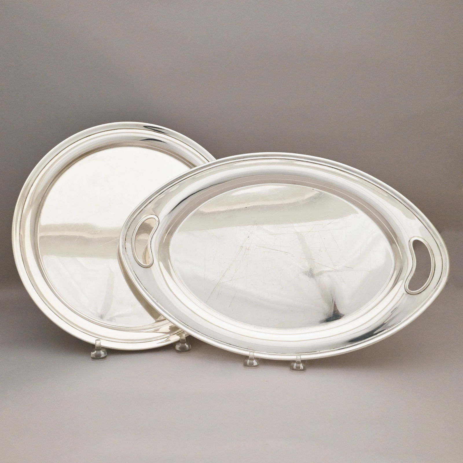 Two American Sterling Silver Serving Trays: Two American Sterling Silver Serving Trays, Gorham Mfg. Co., Providence, Rhode Island, 20th Century. Both not monogrammed, the first circular with molded rim, factory marks and pattern number "43370;"