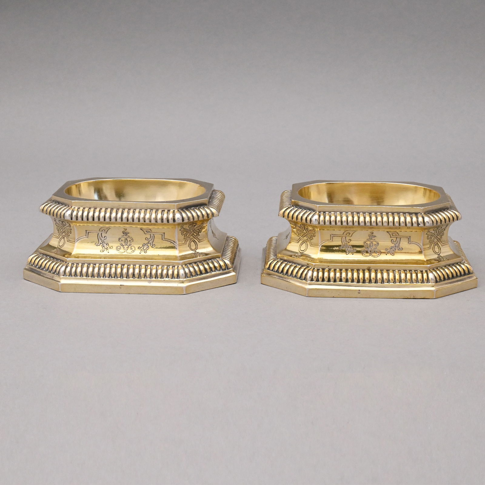 Pair French Silver-Gilt Salt Cellars, Boin-Taburet: Pair of French Silver-Gilt Salt Cellars, Maison Boin-Taburet, Paris, 1873-1900. Each in Louis XVI style, engraved around the sides with leaves, scrolls and foliate strapwork within lobed borders,