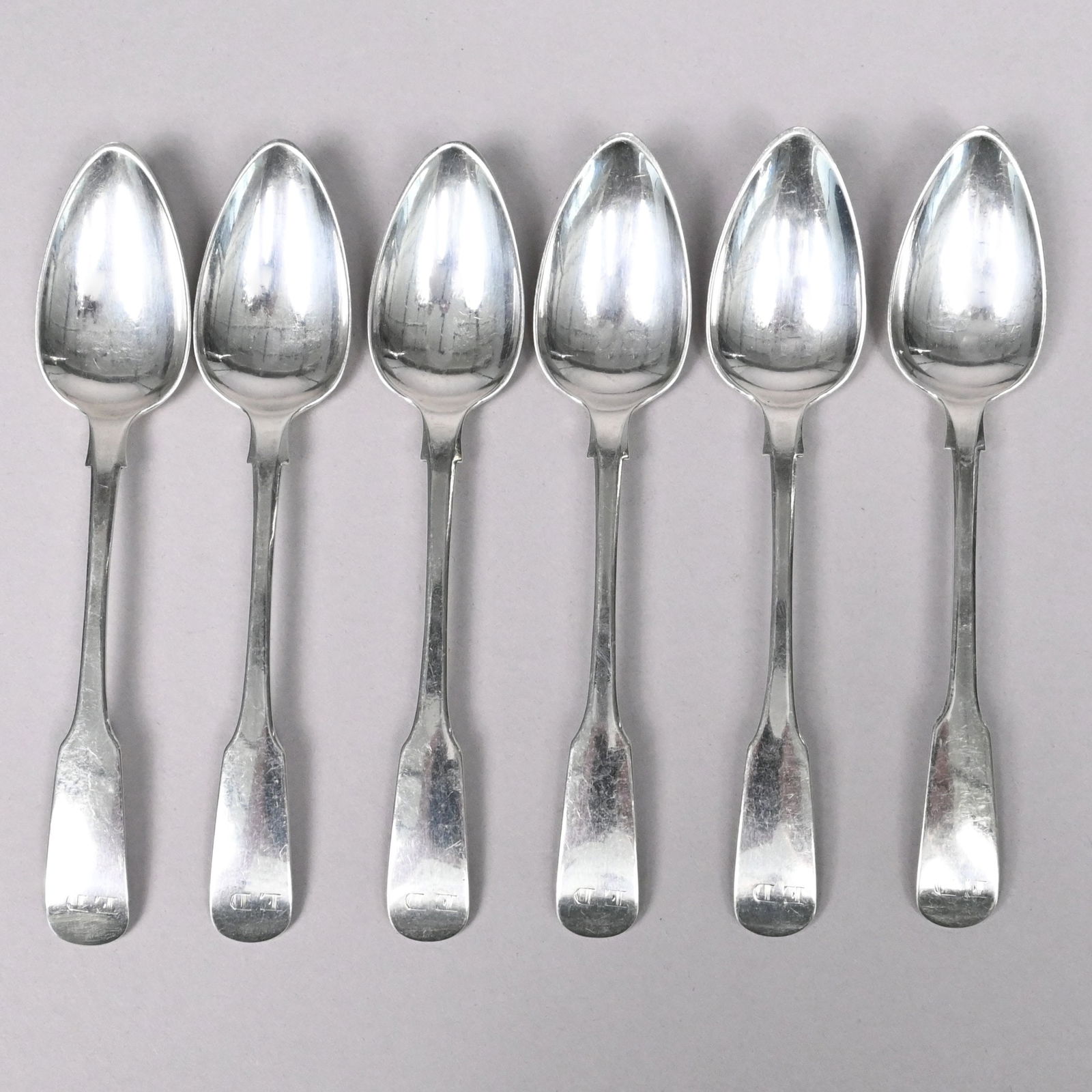 Six Channel Islands Silver Teaspoons, CW Quesnel: Set of Six Channel Island Sterling Silver Teaspoons, Bailiwick of Jersey, Charles William Quesnel, 1825-1855. Each fiddle handle engraved with the initials "ED," each struck once with the initials