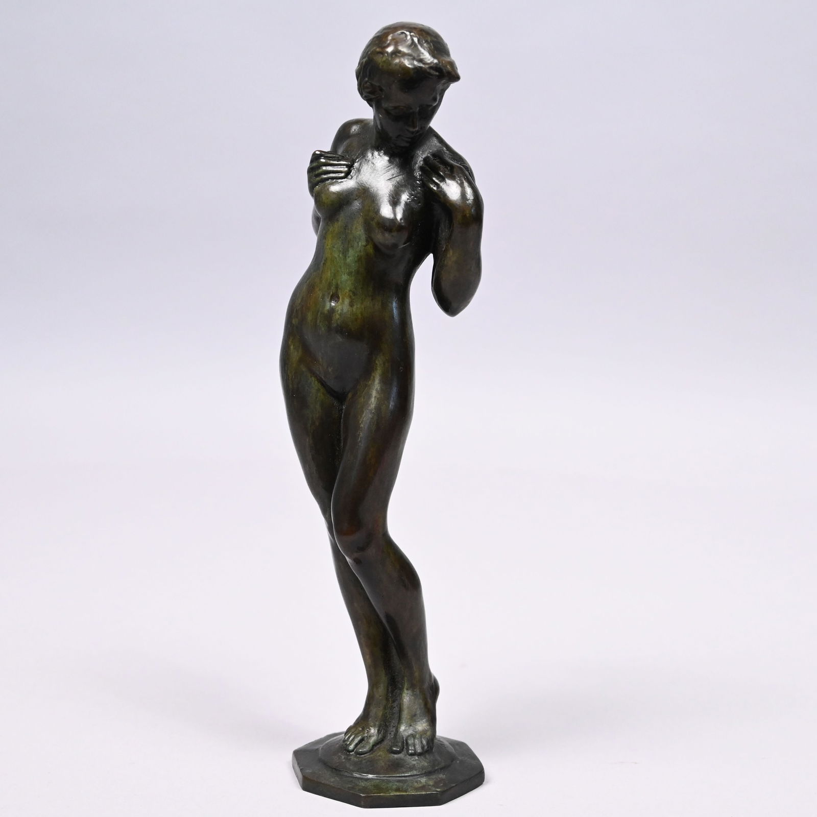 Karl Heinrich Gruppe - Standing Nude Female Figure: Karl Heinrich Gruppe (American 1893-1982). Patinated-Bronze Standing Nude Female Figure. In dark brown-green patina, signed "(K) ARL GRUPPE" on top of the base, no foundry mark.H: 9.875 in., W: 3.5