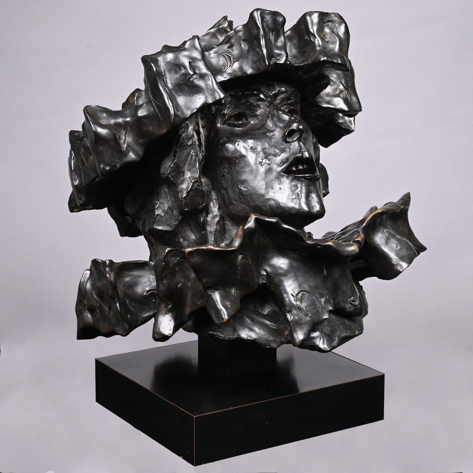 David Aronson - "Spinoza": David Aronson (American, 1923-2015). "Spinoza," Large Patinated-Bronze Bust. In dark brown/ black patina, signed "Aronson," numbered 10/ 12 and stamped with a foundry mark on the reverse; raised on a