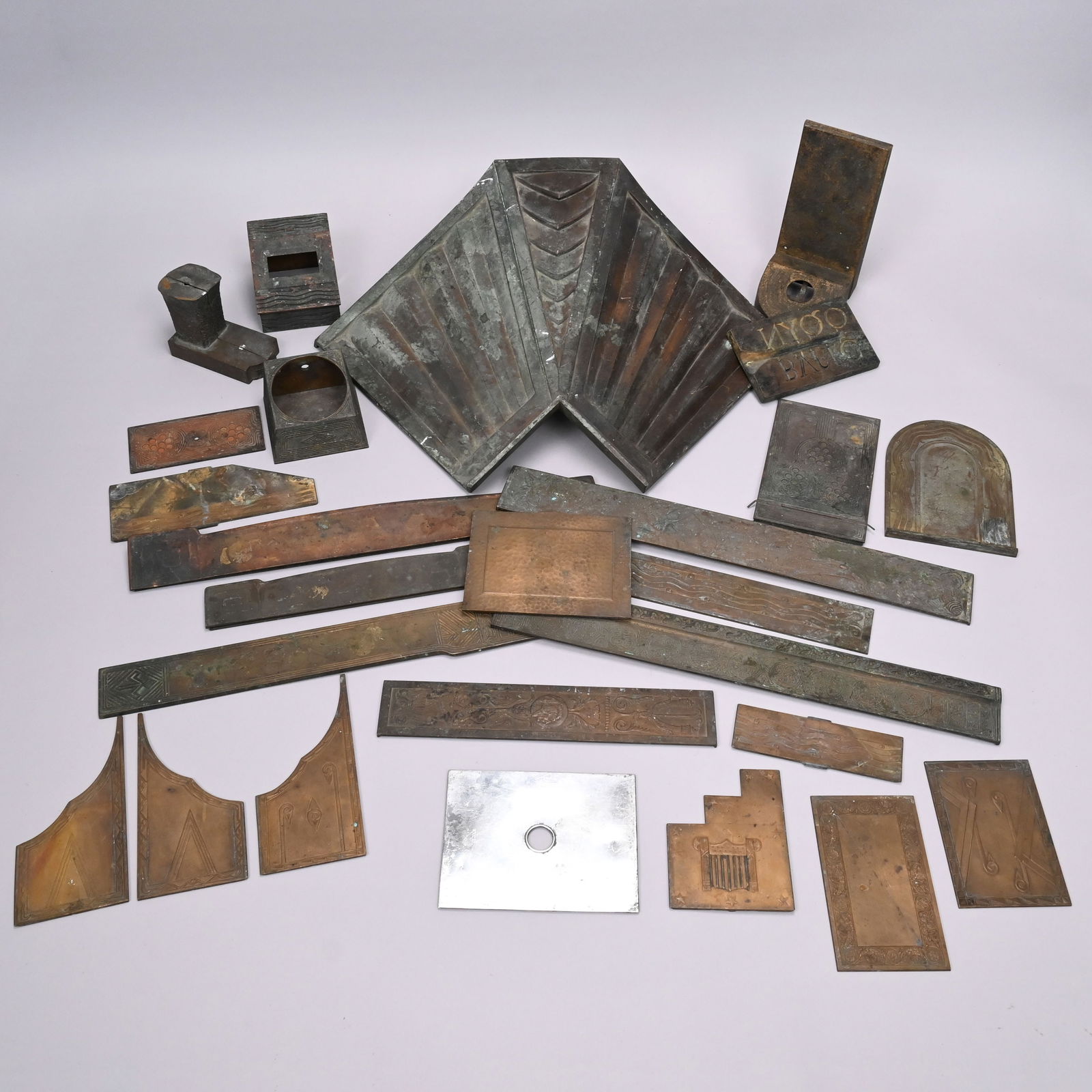 Group Tiffany & Co. Bronze Casting Models: Group of Tiffany & Co. Bronze Furniture and Architectural Casting Molds, Early 20th Century. Most in Art Deco style and in various geometric and aquatic patterns, comprising molds for plates, panels,