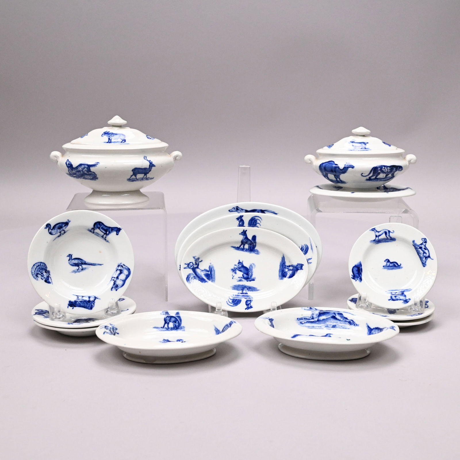 'Animals',Staffordshire Child's Toy Dinner Service: 'Animals', Staffordshire Blue Transfer-Printed Children's Toy Part Dinner Service, W.T. Copeland, 1894. Comprising three 4-inch soup plates, three 3.375-inch plates, three graduated platters, two