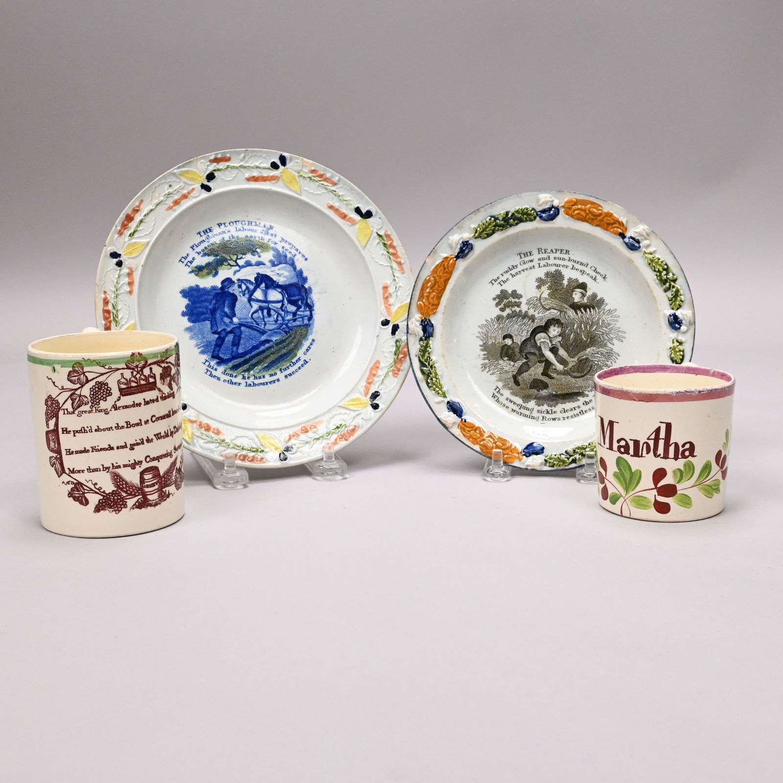 Two Staffordshire Printed Child's Mugs& Two Plates: Two Staffordshire Transfer-Printed and Enamel-Decorated Children's Mugs and Two Motto Plates, 1800-1850. Comprising a creamware mug printed in brown with the verse "The great King Alexander hated