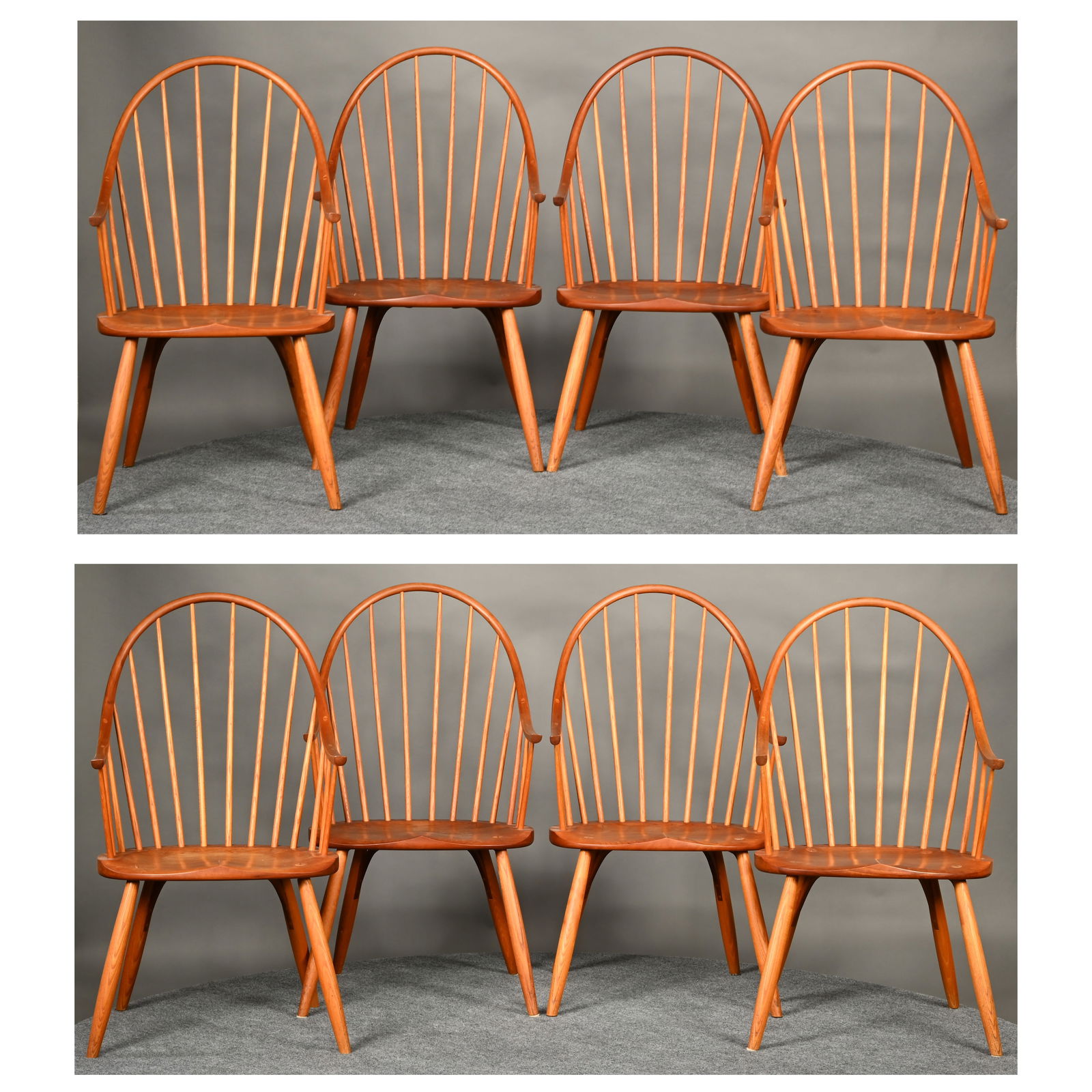 Set of Eight Cherry Dining Chairs, Thomas Moser: Set of Eight Cherry Windsor Dining Chairs, Thomas Moser Cabinetmakers, New Gloucester, Maine, 1984. Each arched back with fourteen spindles above a plank seat, raised on slightly swelled turned legs,