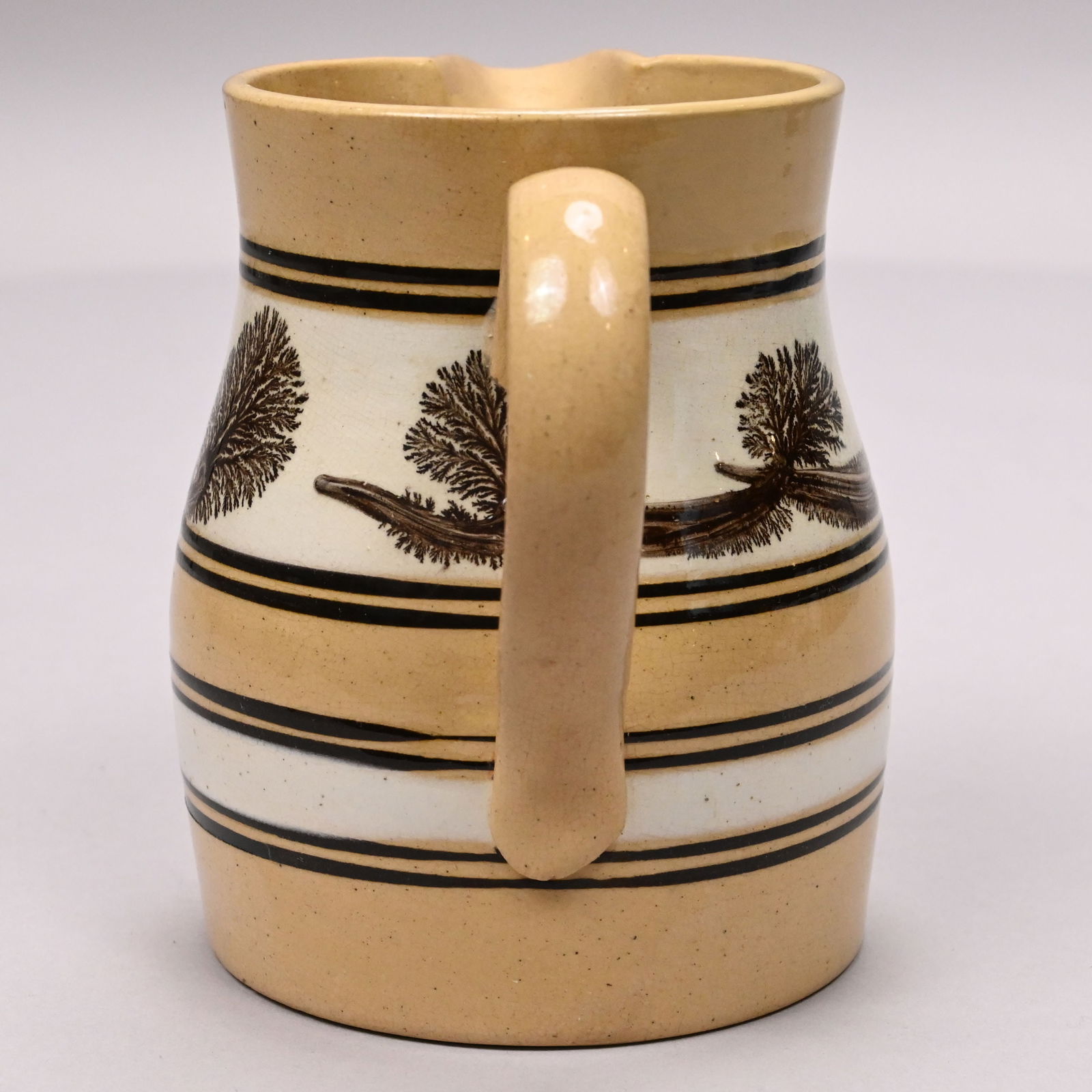 Two Yellowware Dendritic Slip-Banded MochawareJugs - 11