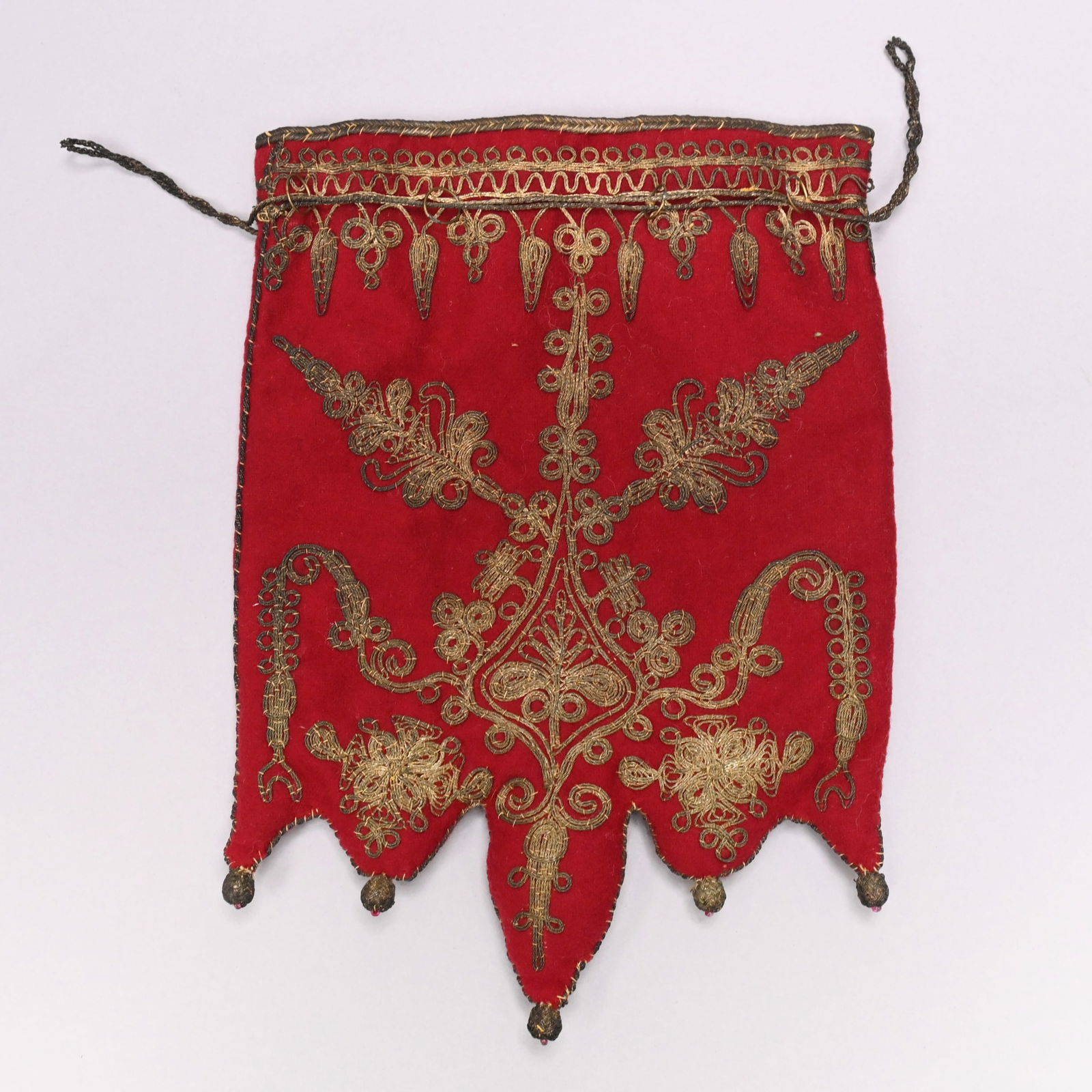 TurkishOttoman Greek/Balkans Embroidered Money Bag: Turkish Ottoman Greek or Balkans Embroidered Red Velvet Money Bag, 19th Century. Worked in gold metallic thread with leafy stems and floral arabesques beneath a stylized flower and leaf border.H: