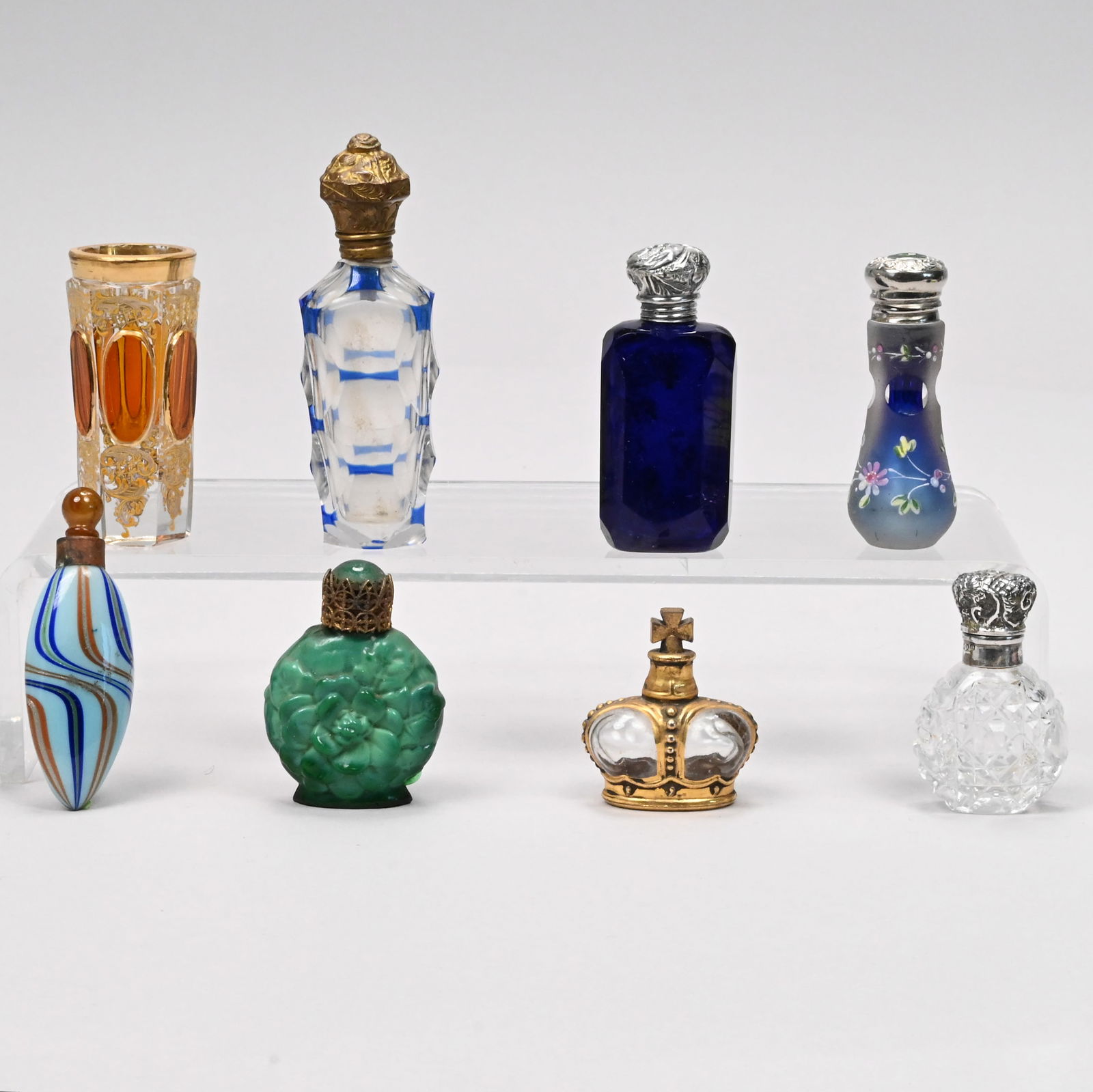 Seven Amer, English & Contin. Glass Scent Bottles: Seven American, English and Continental Glass Scent Bottles and a Toothpick Holder, Late 19th-Early 20th Century. Comprising an enamelled cased cobalt blue glass lay down scent bottle, Mount