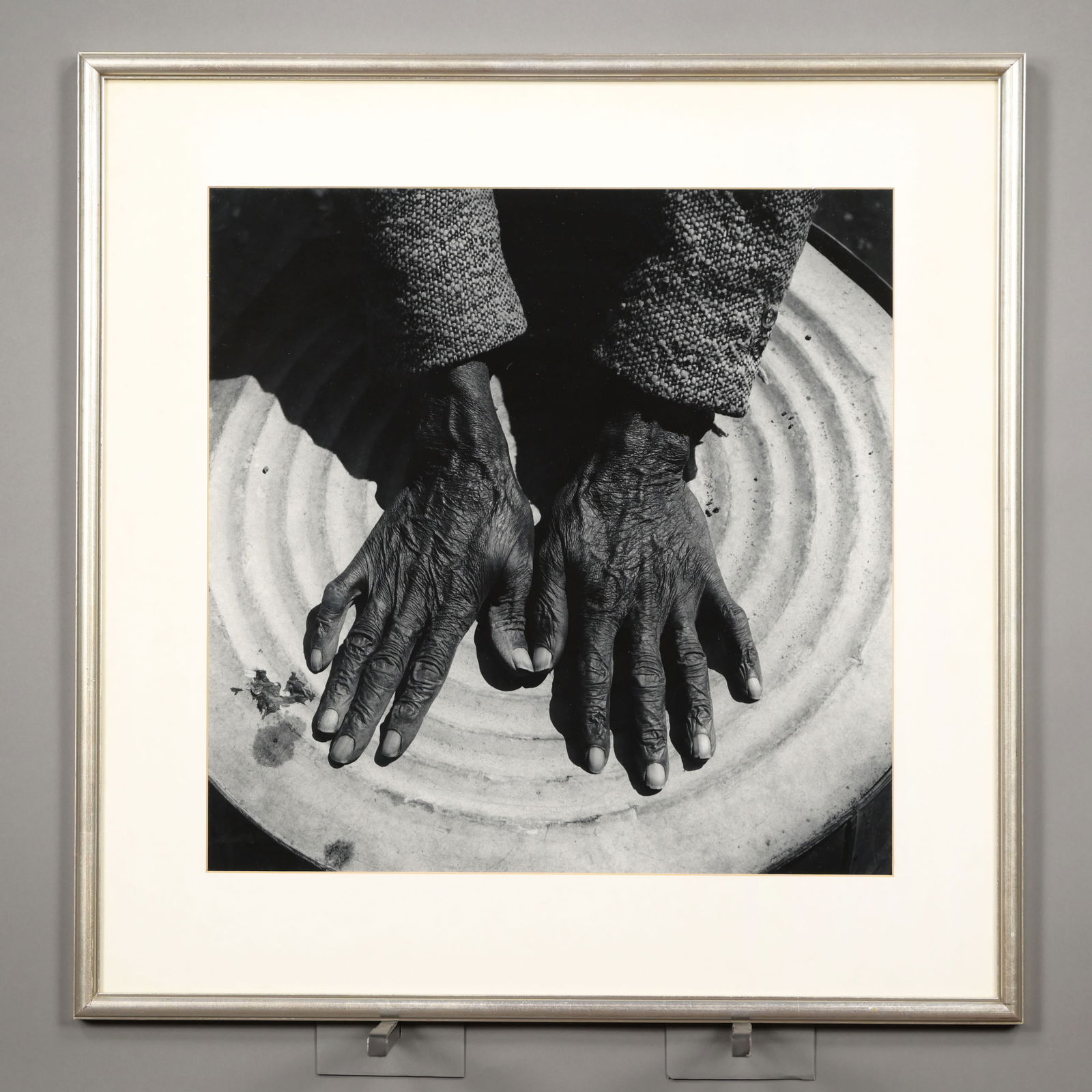 Debbie Fleming Caffery - "Harry's Hands": Debbie Fleming Caffery (American/Louisiana, b. 1948). "Harry's Hands", 1984. Gelatin silver print, (18.5 x 18.5 inches, sight).Frame: H: 26 in., W: 25.5 in., D: 1 in.Note: The black and White