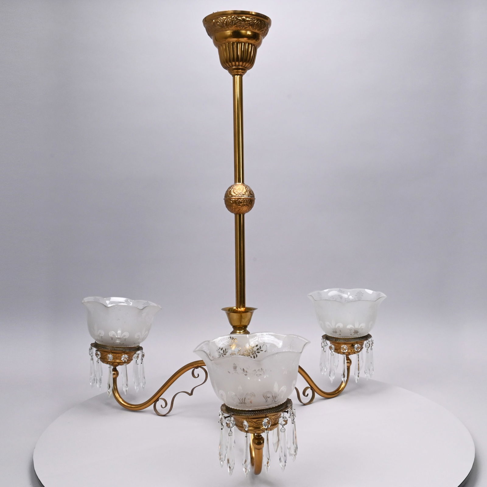 American Brass 3-Light Gasolier, Late 19th Century: American Brass Three-Light Gasolier (Chandelier), Late 19th Century. Each ball knop stamped in rococo style with trellis diaperwork scroll and ruffled cartouches, each hollow arm affixed with a