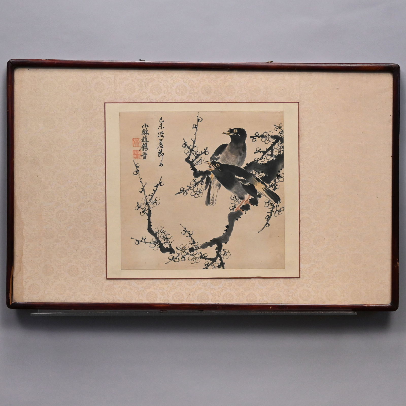 Chinese Ink Painting of Two Birds on Prunus Branch: Chinese Ink Painting of Two Birds on Prunus Branches. With two red character marks in the upper left, on a beige silk background, black ink and wash on paper, (13.25 x 14.5 inches).Frame: H: 19 in.,