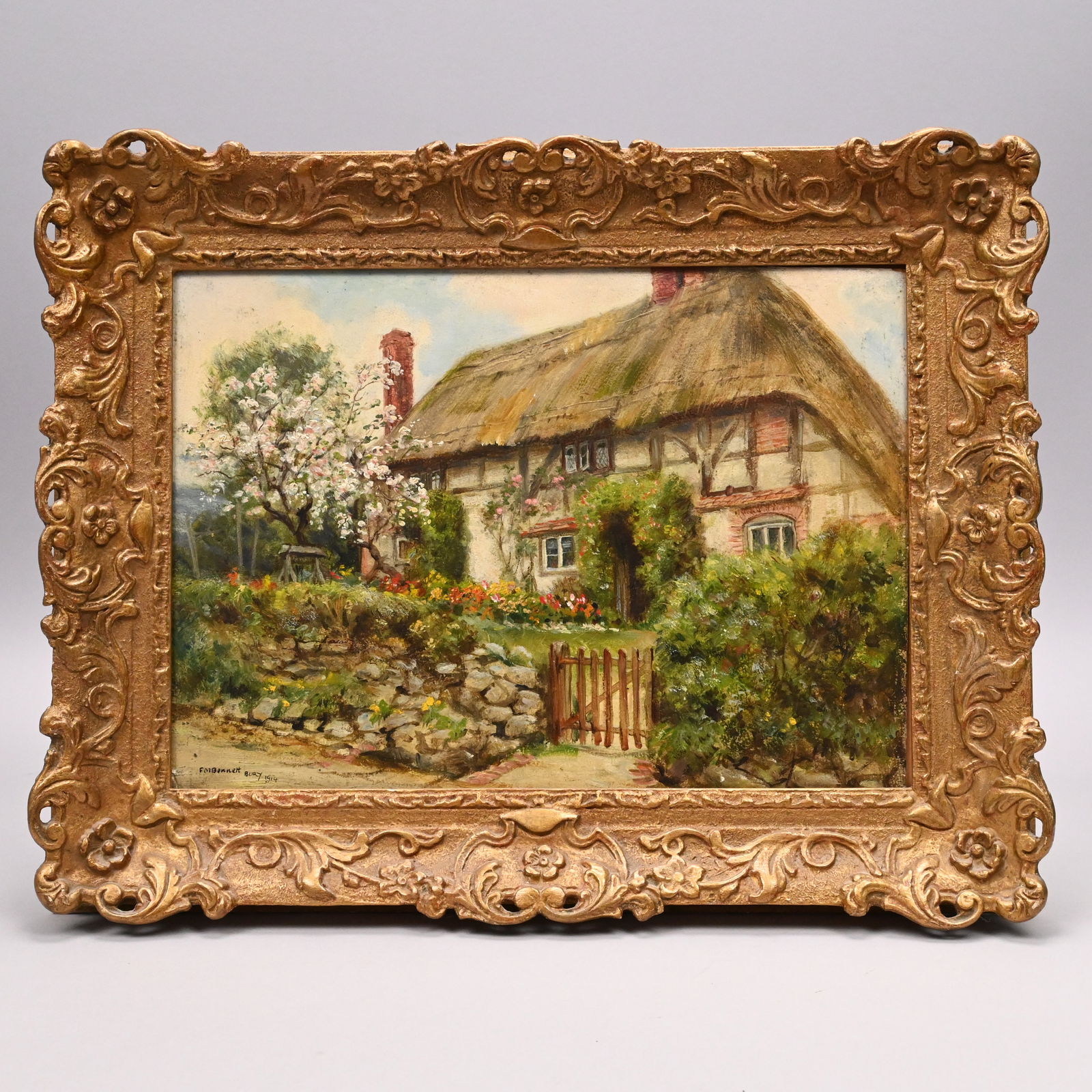 Frank Moss Bennett - "An Old Cottage at Bury": Frank Moss Bennett (British, 1874 - 1953). "An Old Cottage at Bury." Oil on board, signed and dated "F. M. Bennett/Bury 1914" lower left, (9.75 x 13.5 inches), the reverse with label for Aldridge