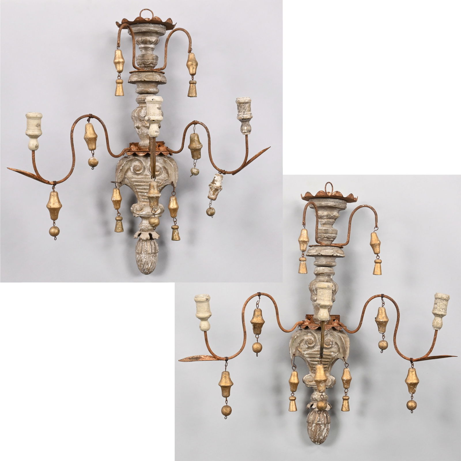 Pair of Italian Carved Wood Two-Light Sconces: Pair of Italian Carved Wood Two-Light Sconces. Each vase-form standard carved with acanthus leaves above a fluted scroll-edged urn suspending gilt pendants, each metal S-scroll arm with spool-turned