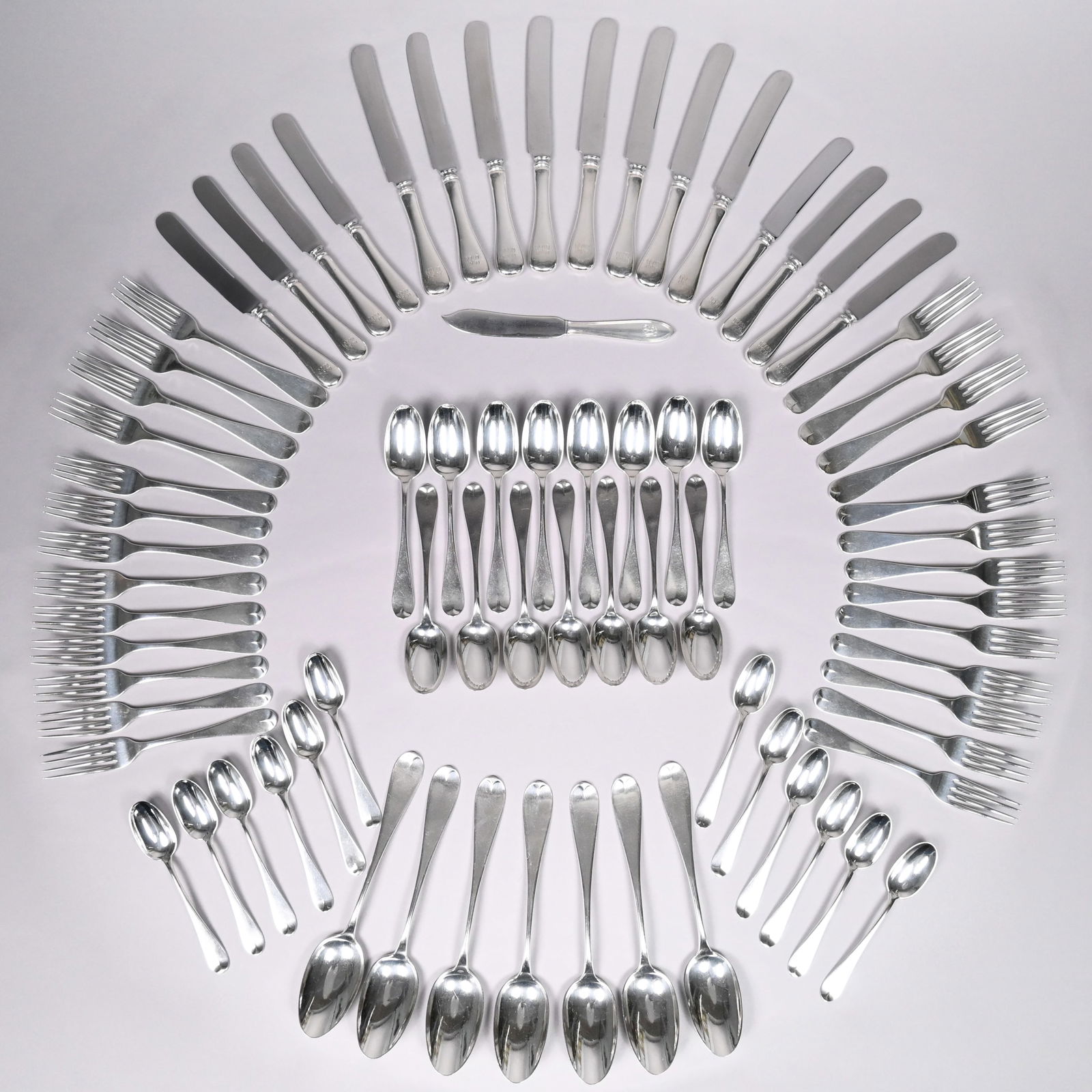 American Sterling Silver Flatware Service: American Sterling Silver 'Tipped' or 'Tipt' Pattern Flatware Service. Comprising seven 8.5-inch cream soup spoons, eighteen 7-inch place forks, eight 7.625-inch dinner forks, eight 8.5-inch knives wit