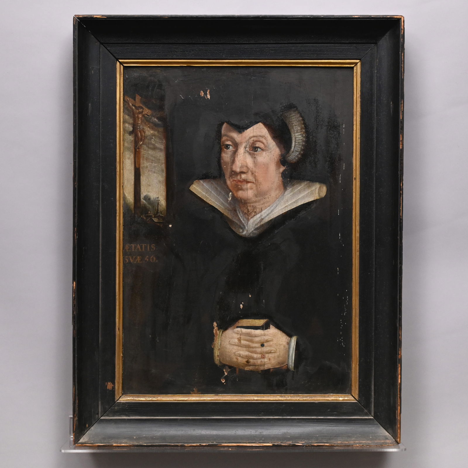 Portrait of a Seventeenth Century Woman: Portrait of a Seventeenth Century Woman. Depicted holding a prayerbook, with scene of crucifixion in the background, oil on cradled wood panel, inscribed "ETATIS/ SUAE 56" in the center left, (24 x