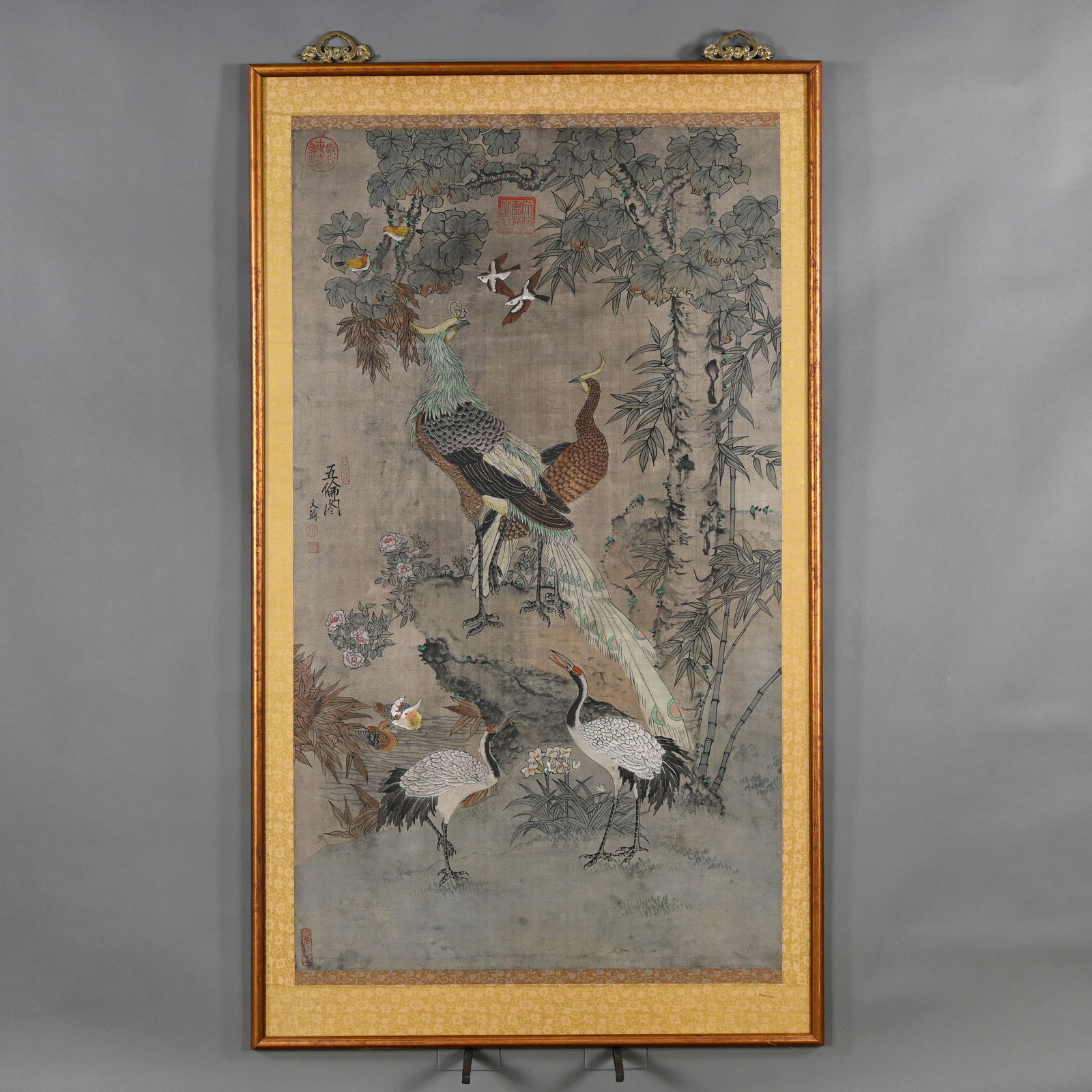 Chinese Silk Scroll: Chinese Silk Scroll. Depicting a pair of pheasants, symbols of good fortune, and a pair of cranes, symbols of longevity, among bamboo, peonies and other birds. Watercolor on silk, with two red