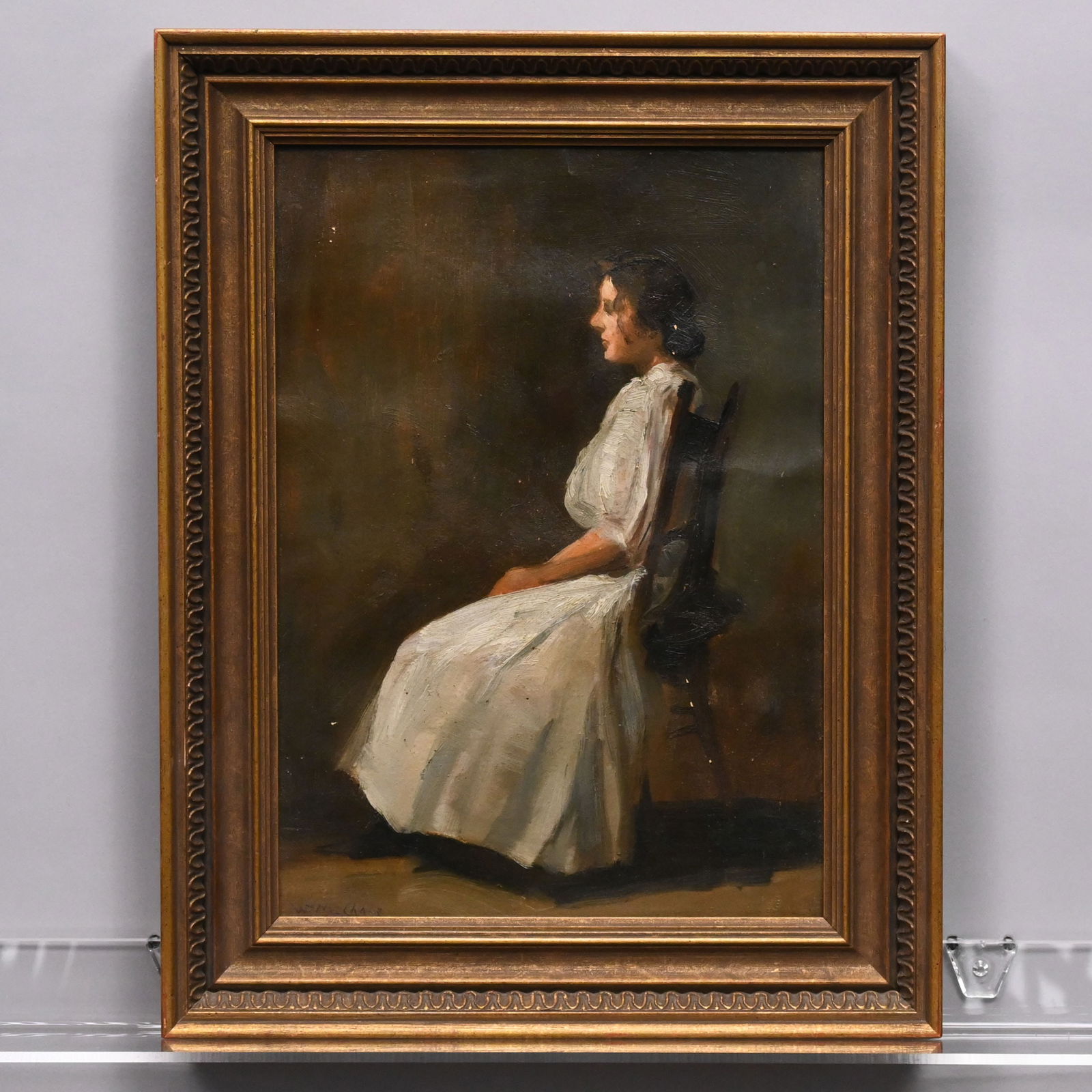 William Merritt Chase - Seated Woman in White: William Merritt Chase (American, 1849 - 1916). Seated Woman in White. Oil on canvas, (14 x 10 inches), signed "Wm M. Chase" lower left. Frame: H: 17.5 in., W: 13.5 in., D: 1.25 in.