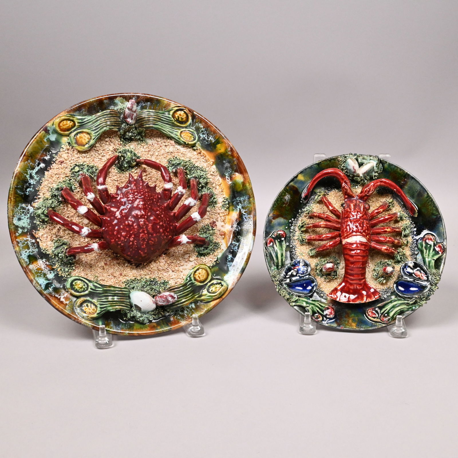 Two Portuguese Majolica Palissy Style Dishes: Two Portuguese Majolica 'Palissy Style' Seafood Hanging Wall Plates, 20th Century. Comprising a 8.625-inch lobster dish, Alvaro Jose, impressed "ALVARO JOSE/ CALDAS DA RAINHA/ PORTUGAL;" and an