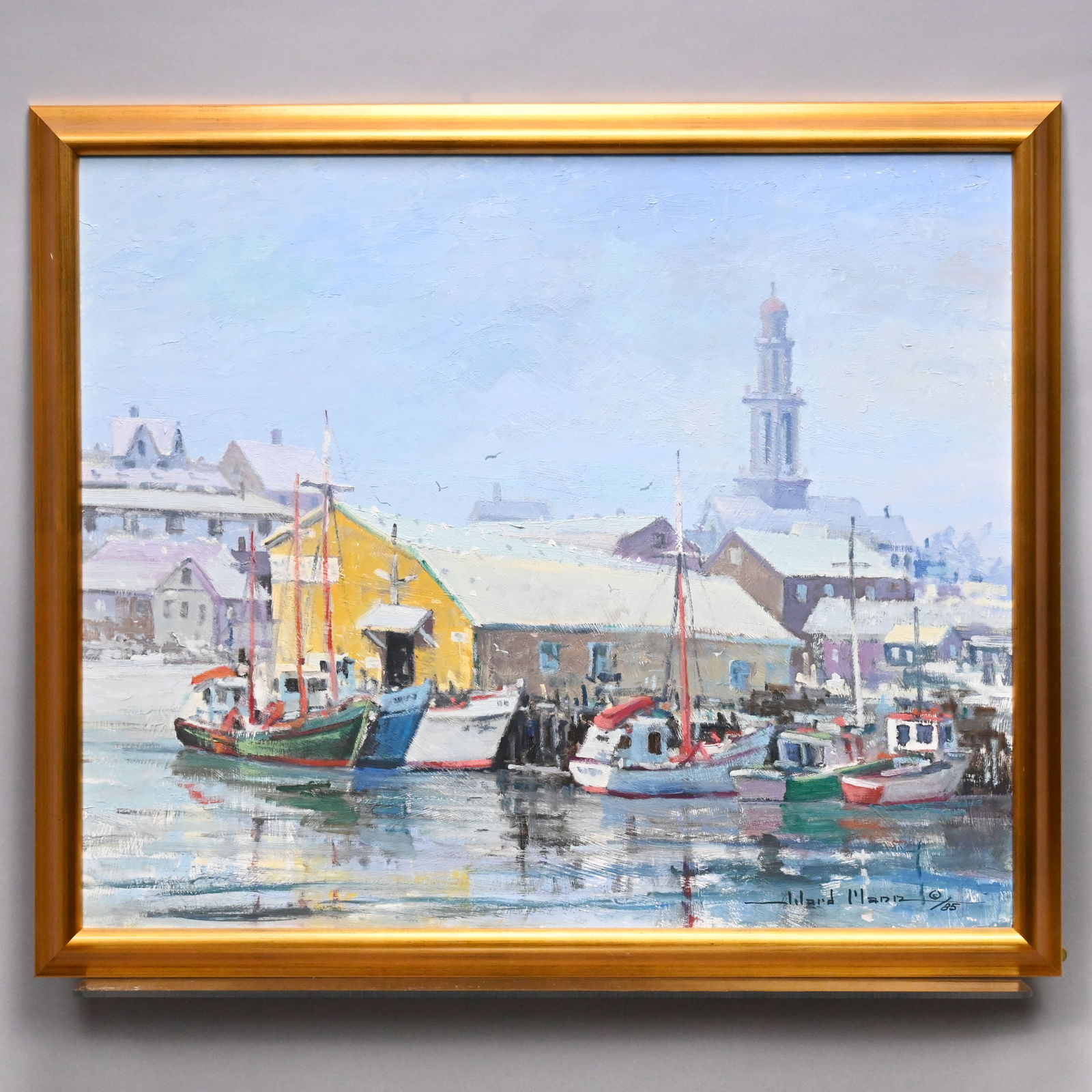 Ward Mann - Gloucester Harbor: Ward Mann (American, 1921 - 2005). Gloucester Harbor. Oil on board, signed and dated "Ward Mann ©/85" lower right, (20 x 24 inches)Frame: H: 22.25 in., W: 26.25 in., D: 1.25 in.