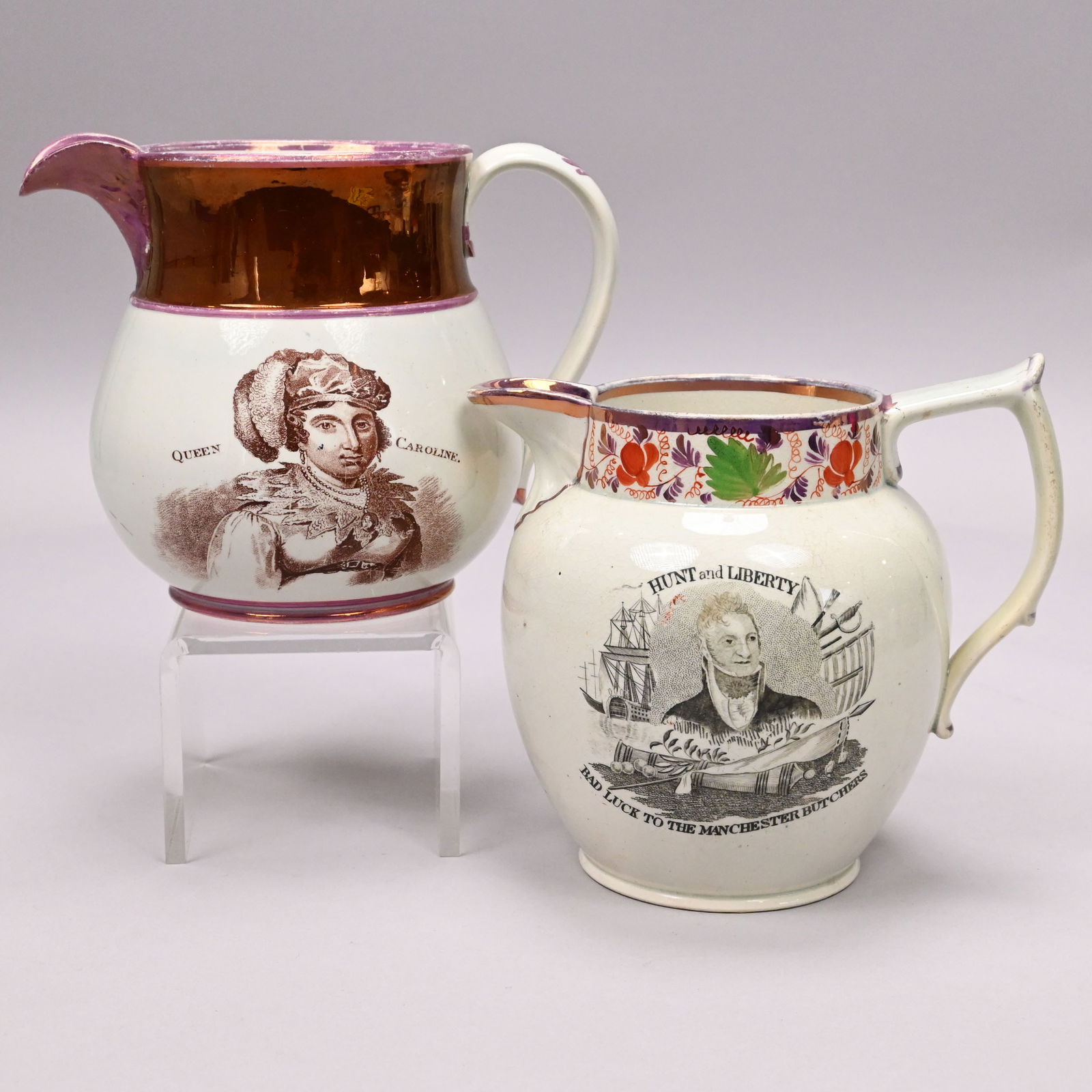 Two English Pearlware Political Jugs: Two English Pearlware Transfer-Printed and Pink Lustre Political Jugs. The first after 1819, printed in black "HUNT and LIBERTY/ BAD LUCK TO THE MANCHESTER BUTCHERS" on one side and "NO CORN BILL/