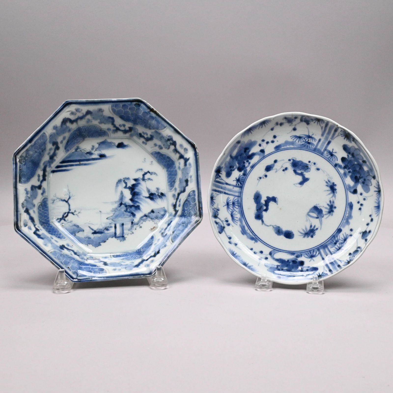 Japanese Porcelain Bowl & Dish, Arita, Edo Period: Japanese Blue and White Porcelain Octagonal Bowl and Dish, Arita, Mid-Edo Period, Late 17th Century. The bowl painted in underglaze-blue with a small building beside an outcropping with gnarled