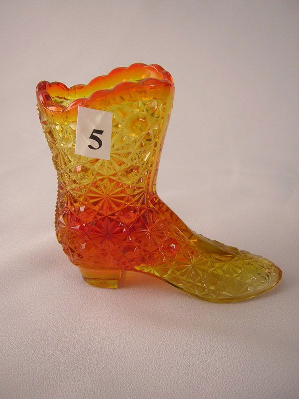 Orange Daisy and Button Boot (1990 OR, 4" tall) made: Orange Daisy and Button Boot (1990 OR, 4" tall) made about 1975. This piece has the Fenton oval logo of the 1970s and is a great example of the Orange glass color that was so difficult to achieve.