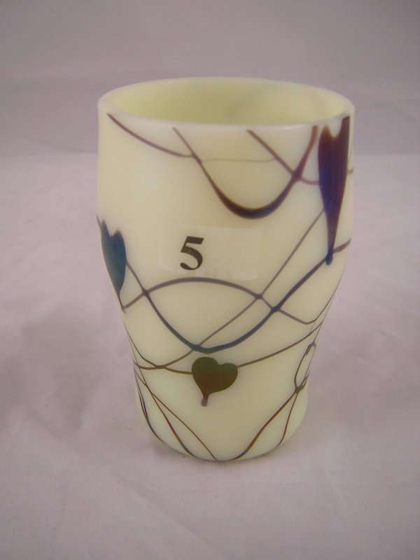 Hanging Hearts sample tumbler: Made as a sample in C: Hanging Hearts sample tumbler: Made as a sample in Custard with applied Hanging Hearts in 1975, this 4" tall tumbler was not in the Fenton line.