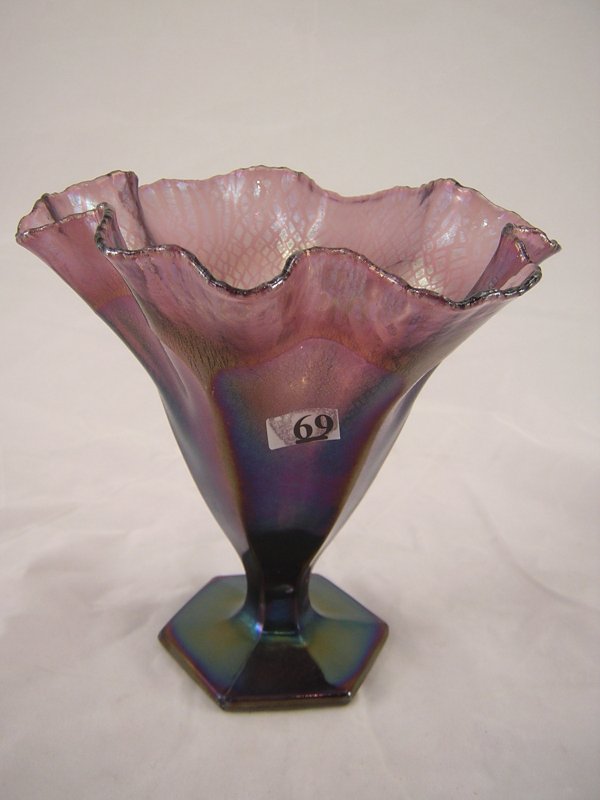 Whimsy: Iridized amethyst 7" tall swung vase with d: Whimsy: Iridized amethyst 7" tall swung vase with dramatic "stretch glass" effect inside. Made recently, this piece come from as mould often used to make the base to a candy box.