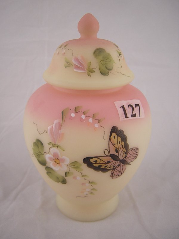 Burmese 7488 Temple Jar and cover with handpainted: Burmese 7488 Temple Jar and cover with handpainted apple blossom and butterfly decoration. Made in 1996 as a special order for 20th anniversary of the Fenton Art Glass Collectors of America, this piec
