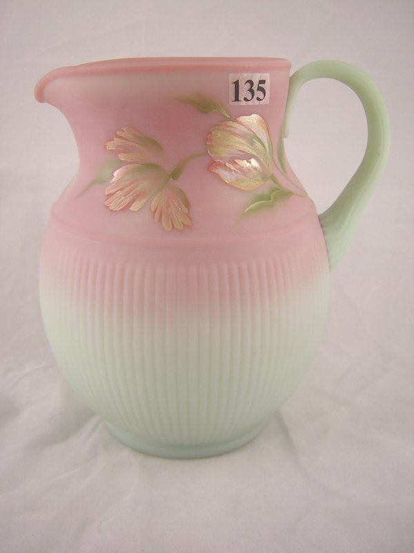 Designer sample: Lotus Mist Burmese "Adams Rib" pi: Designer sample: Lotus Mist Burmese "Adams Rib" pitcher with applied ribbed handle and handpainted floral decoration. Made recently with an original Diamond Glass-Ware mould now owned by Fenton, this 