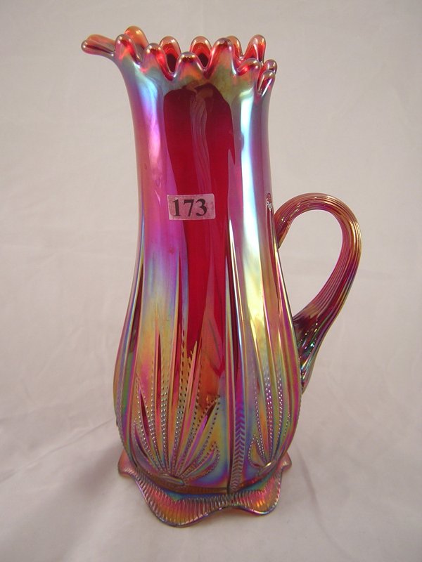 Red Sunset Carnival Cactus pitcher, 10.75" tall. T: Red Sunset Carnival Cactus pitcher, 10.75" tall. This piece was made as part of an order for the Levay Distributing Co. of Edwardsville, Illinois, in 1982.