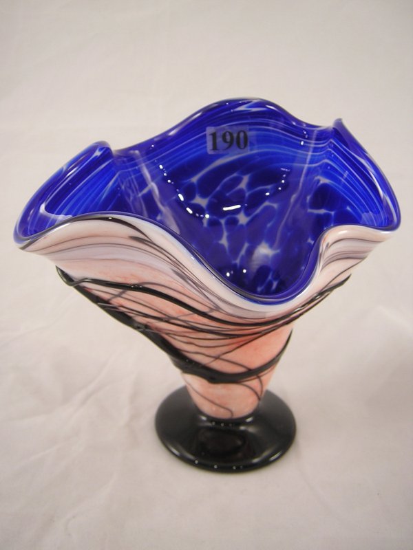 Frank Workman sample: this 6" tall free form vase: Frank Workman sample: this 6" tall free form vase by glass artisan Frank Workman is Milk Glass, and it's decorated with bright cobalt blue frit in the inside and a dusting of fine orange frit on the o