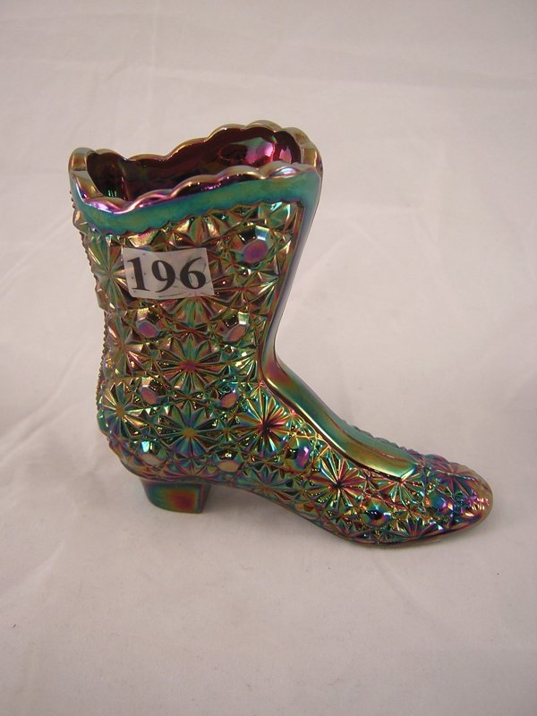 Carnival glass sample: Amethyst Carnival glass 199: Carnival glass sample: Amethyst Carnival glass 1990 Daisy and Button 4" tall boot. This piece does not have a Fenton logo, and records indicate that it was made in the mid-1960s when Fenton was experi