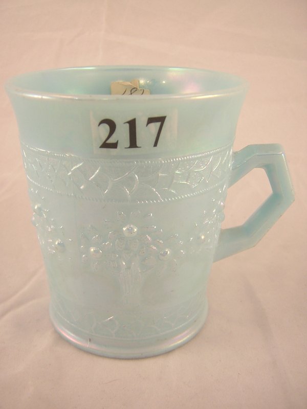 Rare Terry Crider/Fenton mug: This Persian Blue No: Rare Terry Crider/Fenton mug: This Persian Blue No. 595 Orange Tree mug, made by Fenton about 1915, is itself a scarce piece. This one was iridized by glass artisan Terry Crider (probably in the 1970s