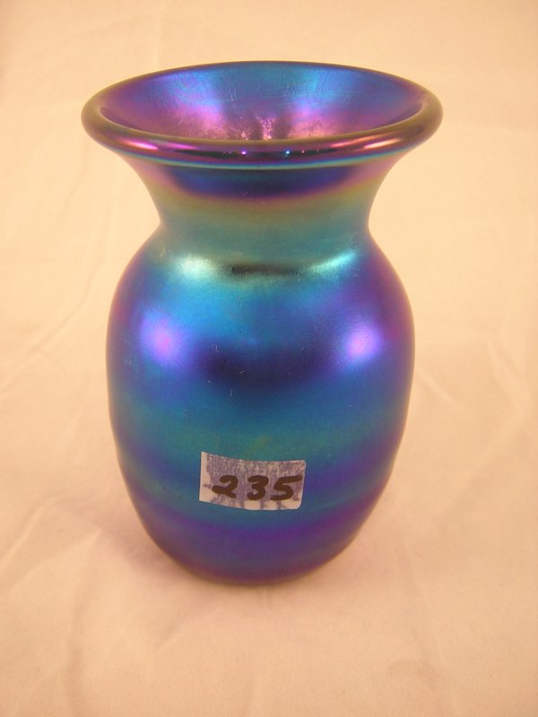 Favrene off hand sample: this 4.25" tall Favrene v: Favrene off hand sample: this 4.25" tall Favrene vase was made off-hand (without moulds) by a skilled glassworker, and the iridescence is simply outstanding. Made ca. 1974-75, this vase has a small po