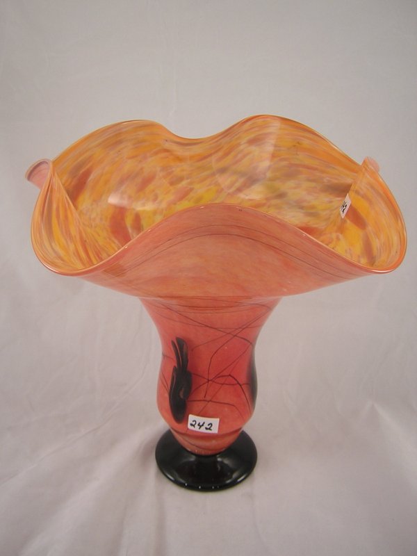 Nathan Sheafor design: Glass artisan Nathan Sheafo: Nathan Sheafor design: Glass artisan Nathan Sheafor designed this vase when he was in residence at Fenton during April 2008. The vase stands 7.5" tall and has an applied black foot. The interior color